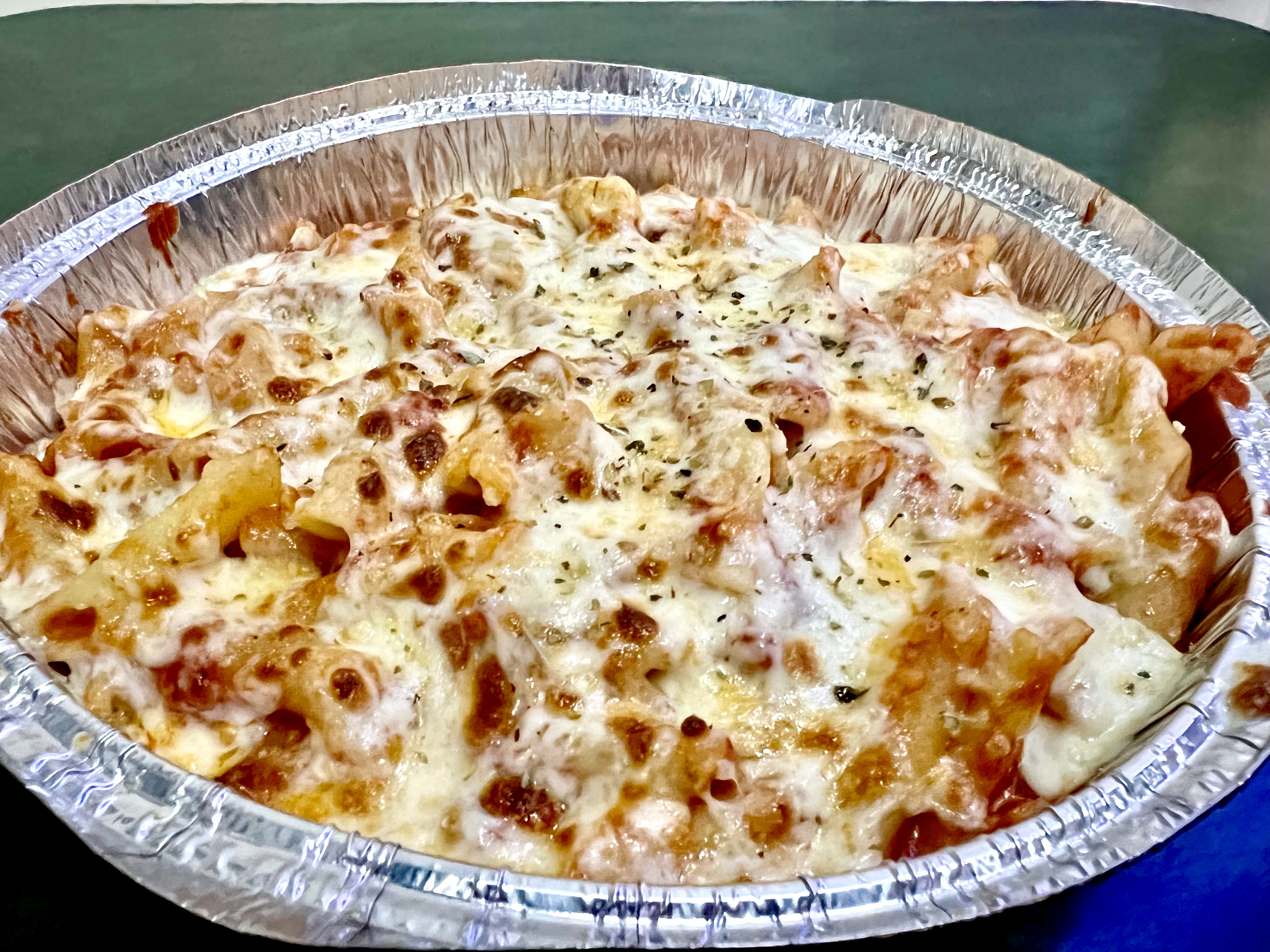 Order Oven baked mostaccioli food online from M&G Pizza store, Chicago on bringmethat.com