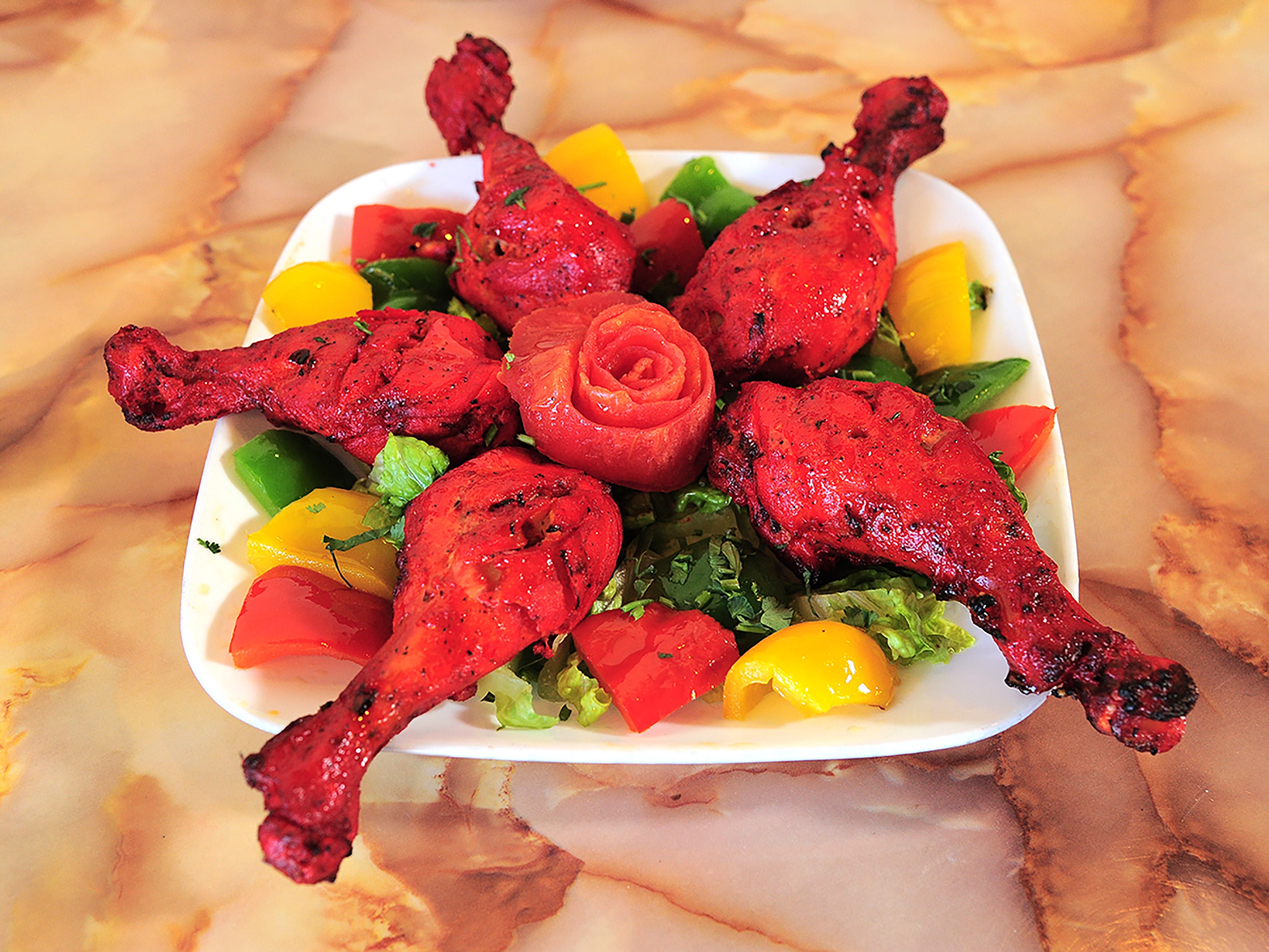 Order 54. Tandoori Chicken food online from Haveli Indian Cuisine store, Rochester on bringmethat.com
