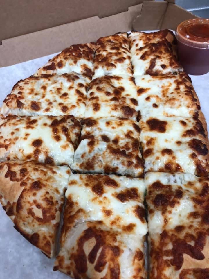 Order Ham & Cheese Calzone - Small food online from Village Pizza store, Ashburnham on bringmethat.com