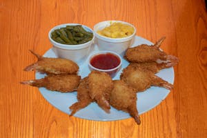 Order Shrimp/2 Sides food online from Pluto's Cafe store, Groesbeck on bringmethat.com