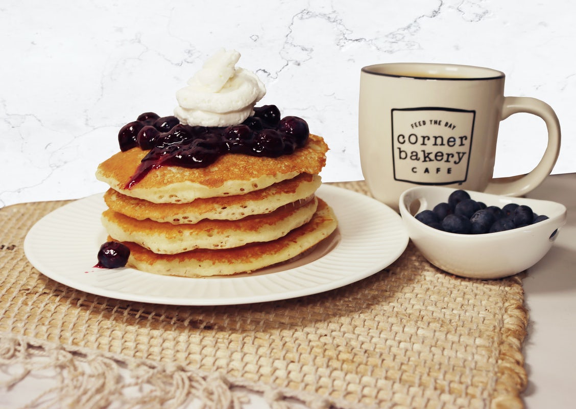 Order Blueberry Pancakes - NEW! food online from Corner Bakery store, Palo Alto on bringmethat.com