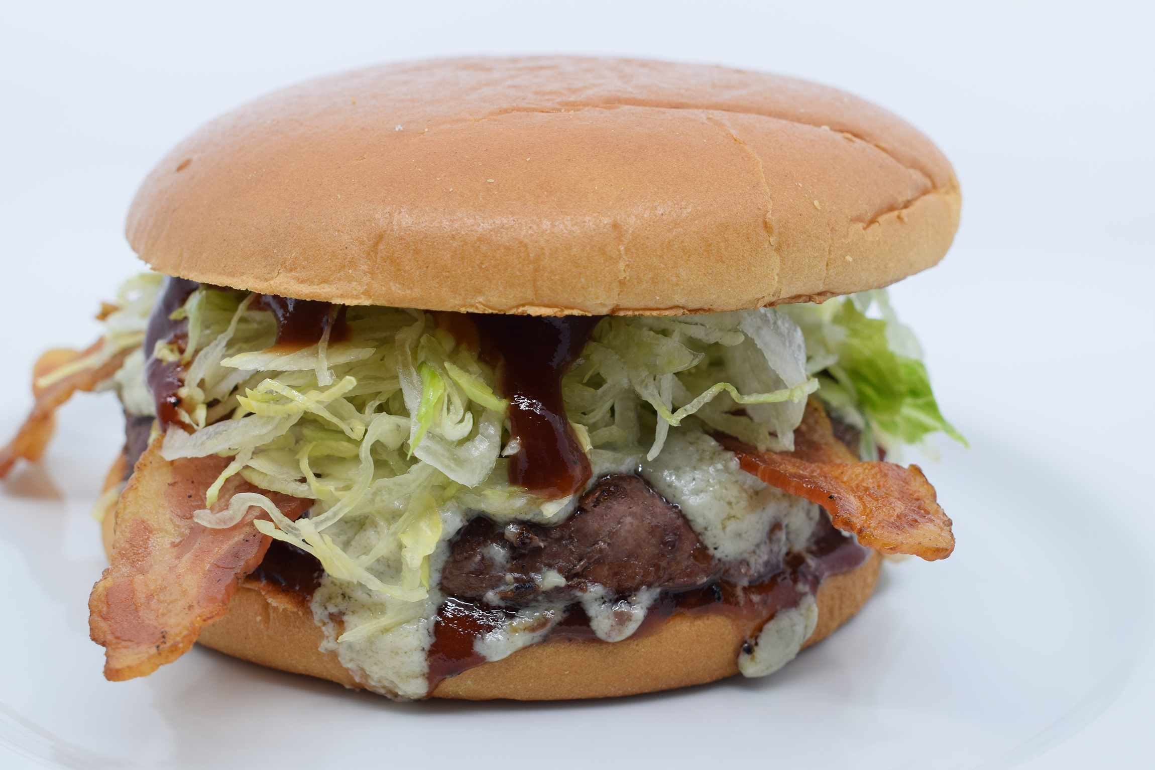 Order THE BBQ BACON BLUE BURGER food online from Mad House Comedy Club store, San Diego on bringmethat.com