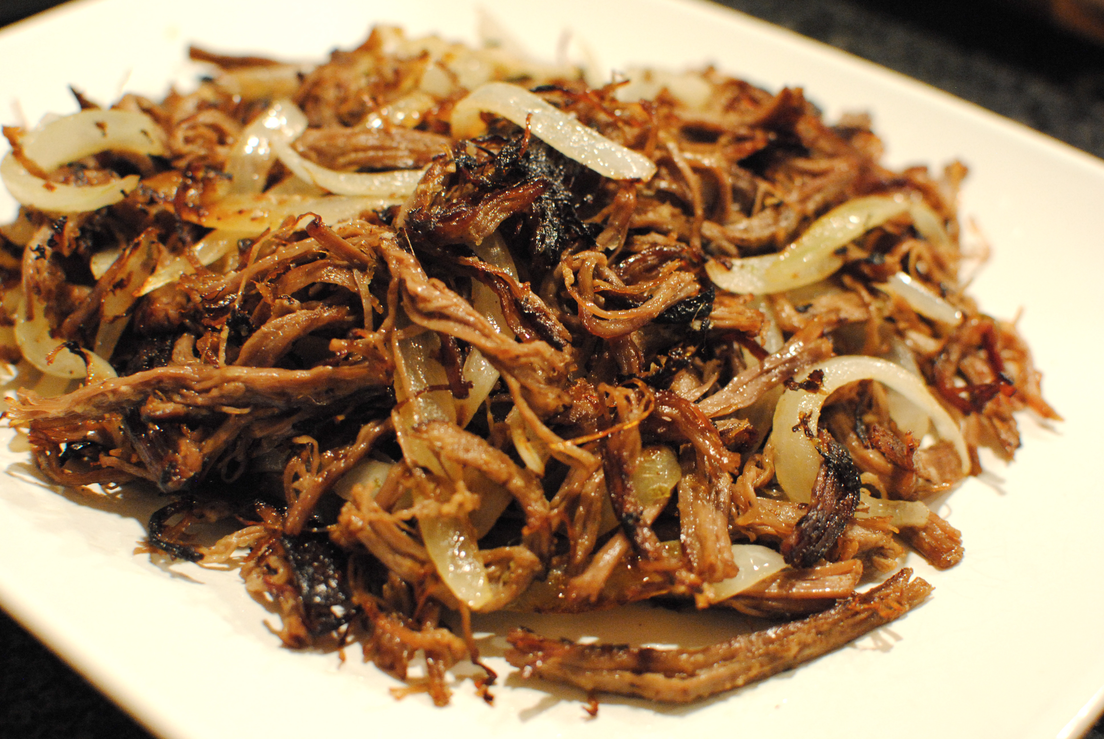 Order Shredded Beef Grilled with Onion and Garlic food online from Malanga Cafe store, Miami on bringmethat.com
