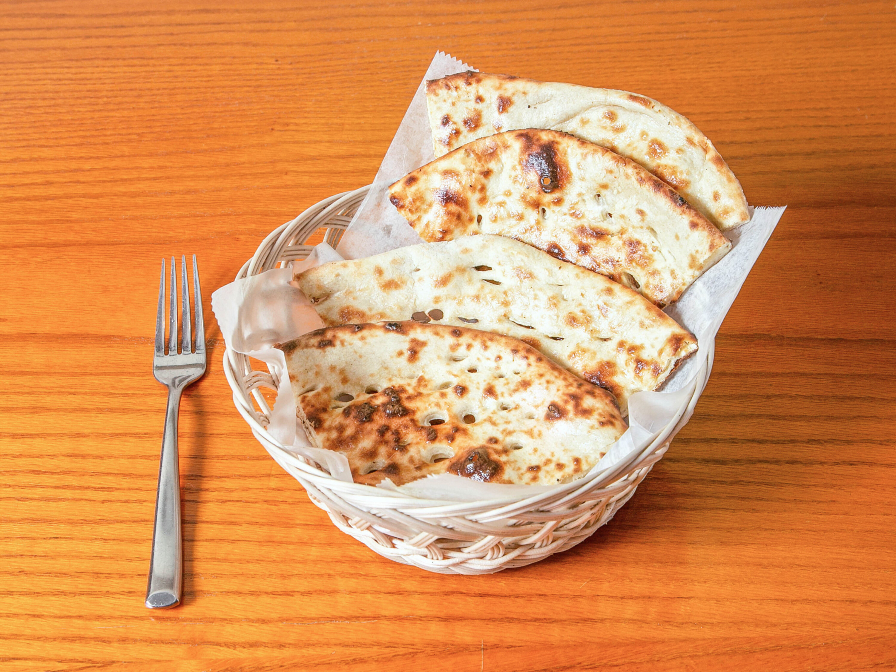 Order Plain Butter Naan food online from Curry Zone store, Flemington on bringmethat.com
