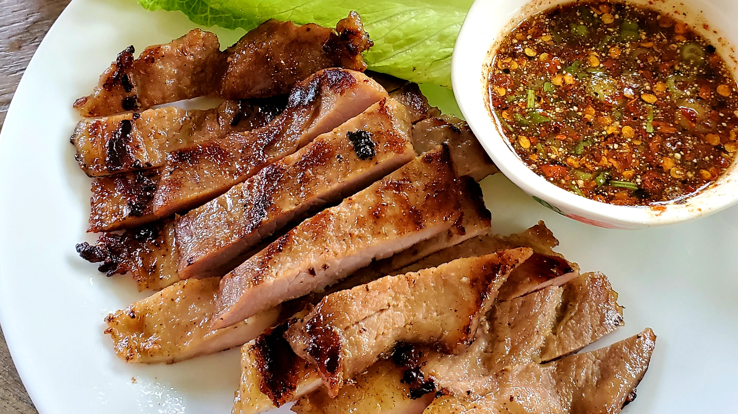 Order Moo Yang (Thai Style Grilled Pork) food online from Thai Paradise store, Severna Park on bringmethat.com