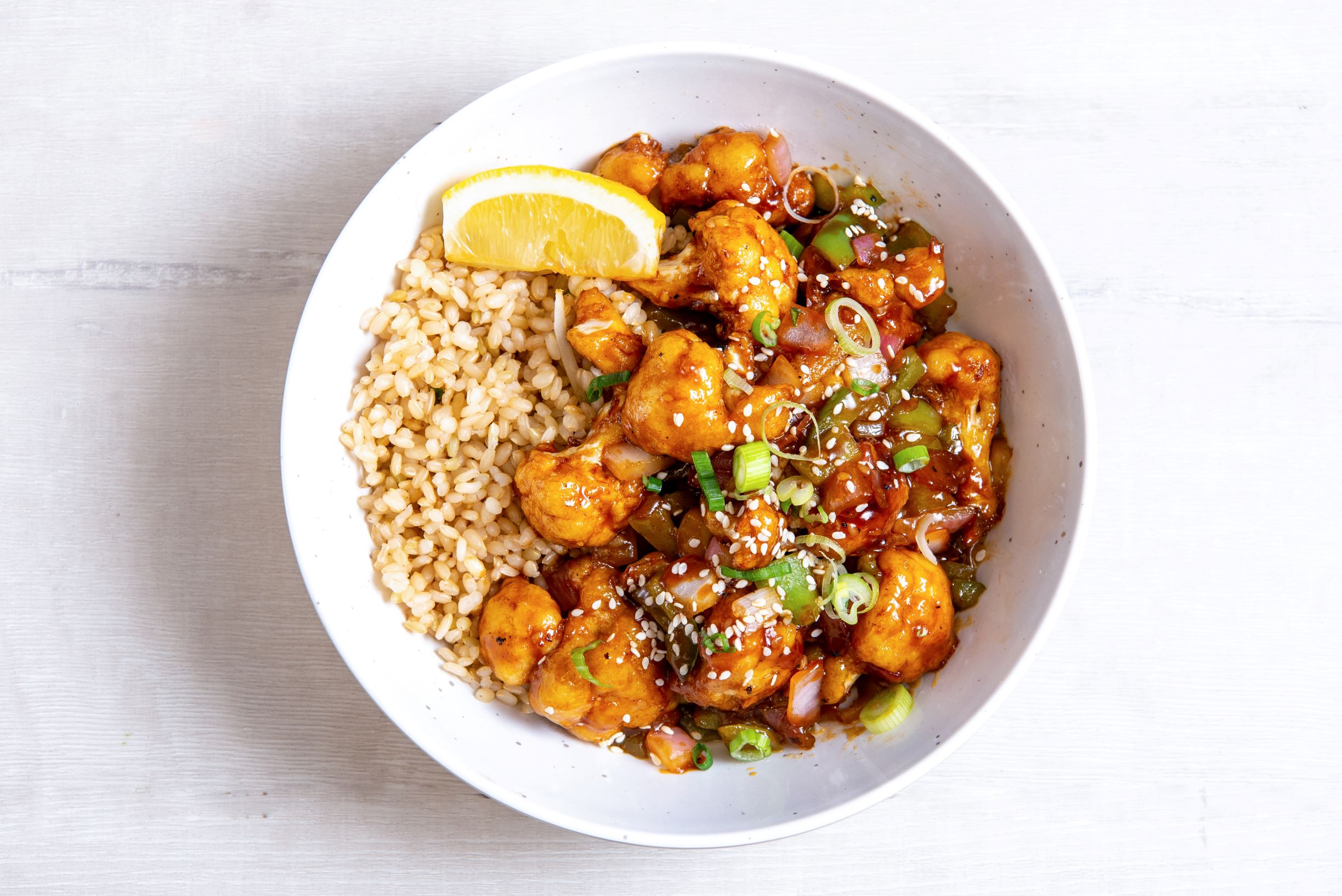 Order Orange Sesame Cauliflower food online from Ginger Bowls (Healthy Asian Bowls - Tempe) store, Tempe on bringmethat.com
