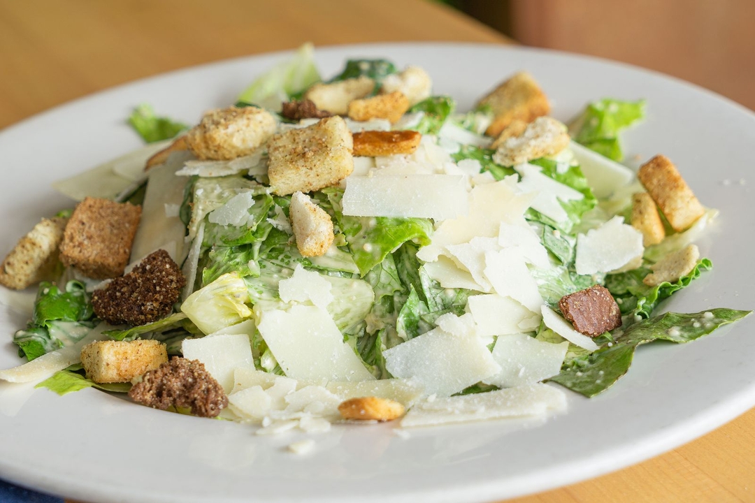 Order Half Caesar Salad food online from Blue Water Grill store, Grand Rapids on bringmethat.com