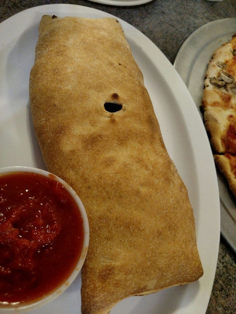 Order Stromboli - Small food online from Poppy's Pizzeria store, Langhorne on bringmethat.com