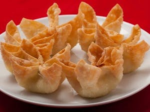 Order Crab Rangoons (3) food online from The Jade Garden store, Lawrence on bringmethat.com