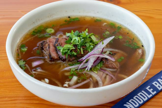 Order Pho Sizzle food online from Mecha Noodle Bar store, Stamford on bringmethat.com