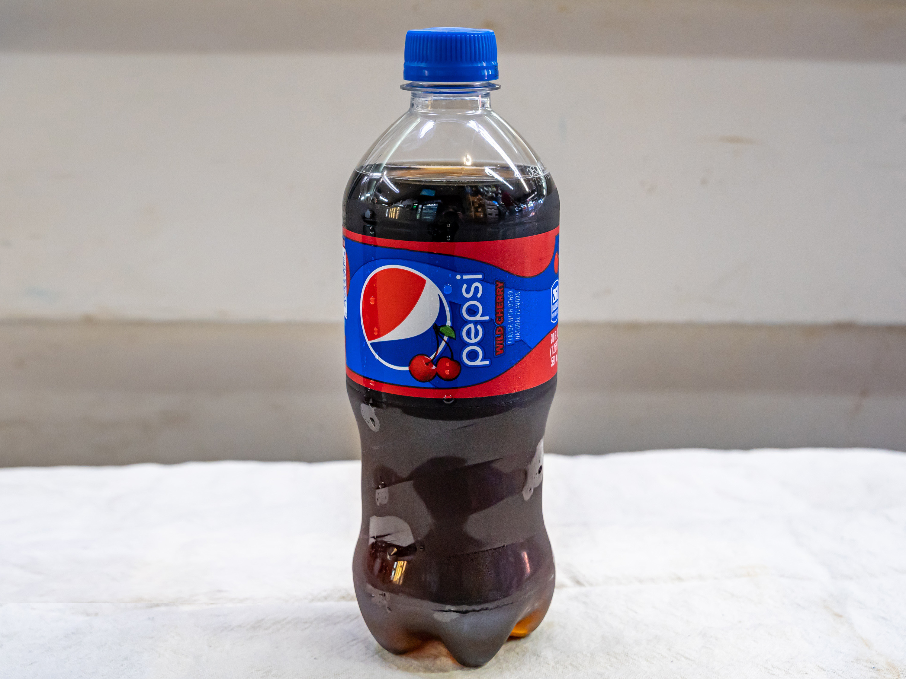 Order Pepsi Cherry - 20oz bottle food online from Quentin Deli and Grocery store, Brooklyn on bringmethat.com
