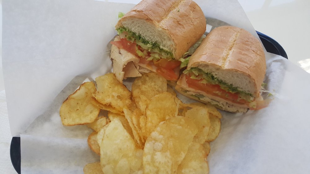 Order Grilled Chicken Pesto Sandwich food online from Cafe Artys II store, Newport Beach on bringmethat.com