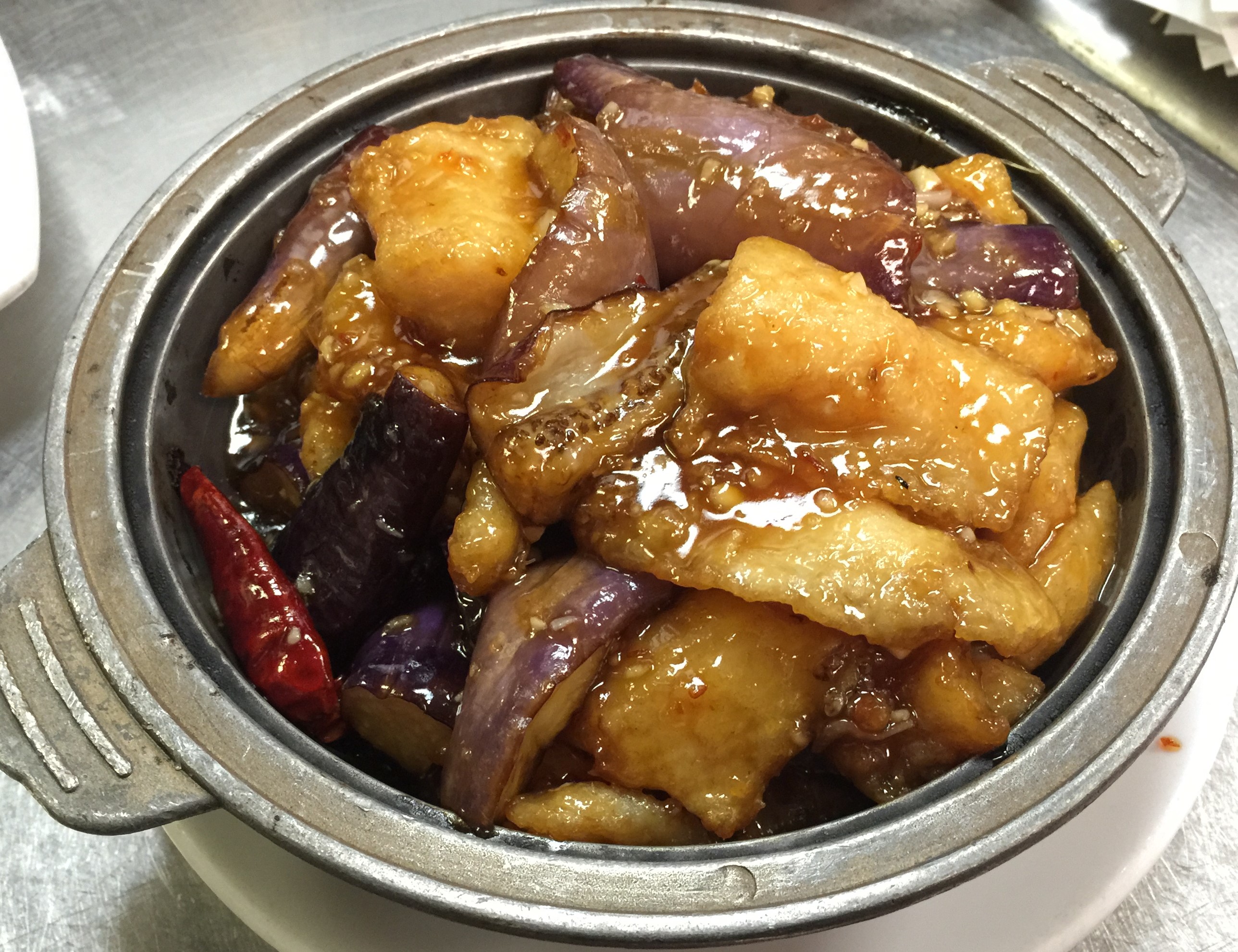 Order Garlic Eggplant with Cod Fillet in Clay Pot food online from Tasty Kitchen store, Davis on bringmethat.com