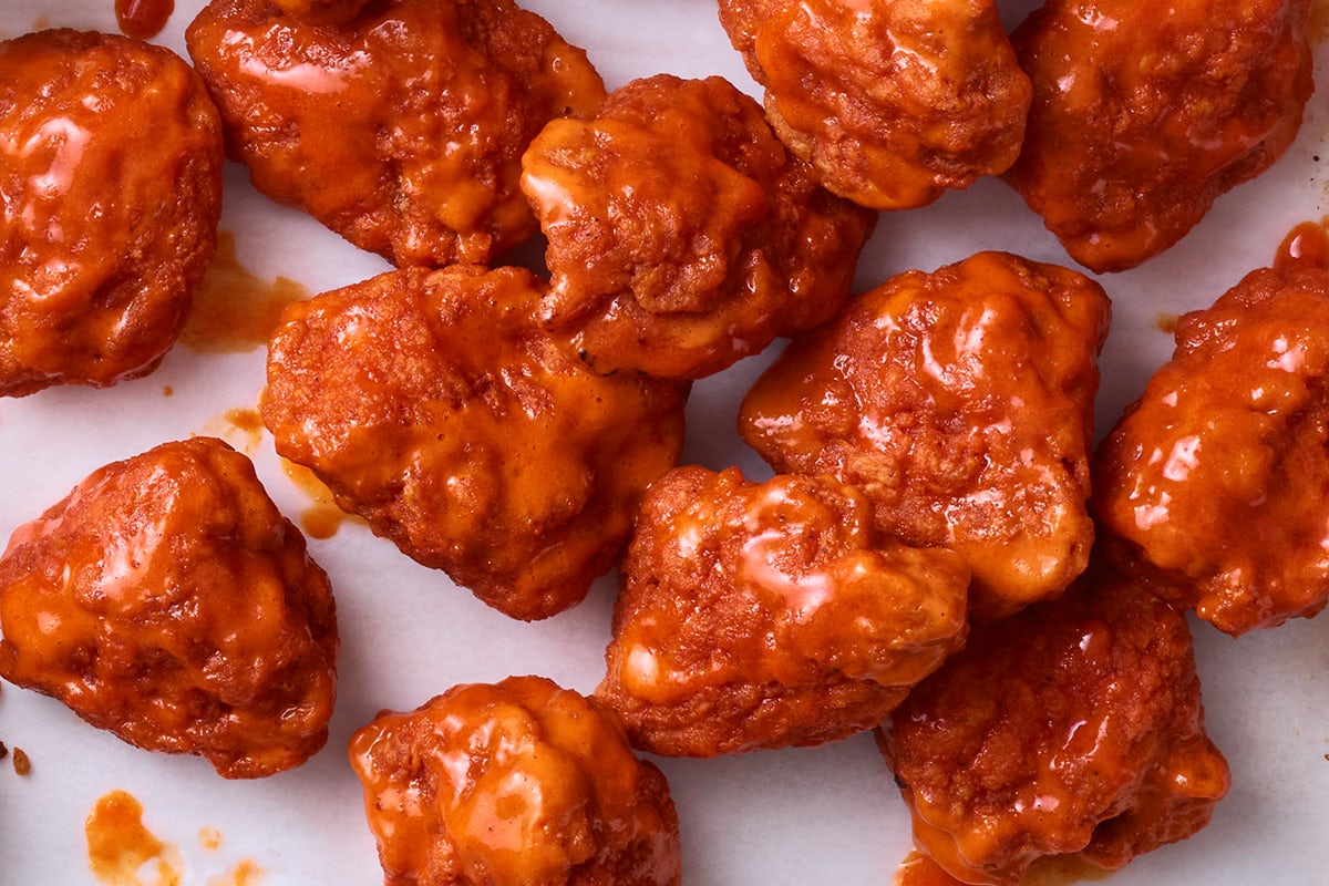 Order Boneless Wings food online from Cosmic Wings store, Tucker on bringmethat.com