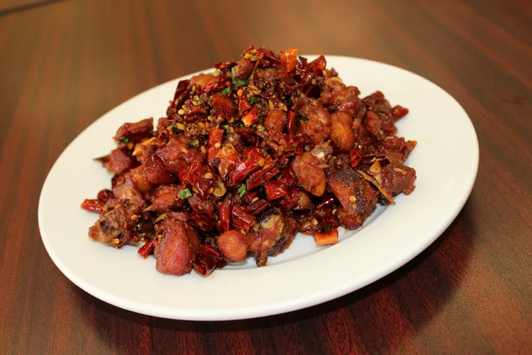 Order 4. Spicy Chicken Boneless香辣鸡丁 food online from North Village Chinese Restaurant store, Dayton on bringmethat.com