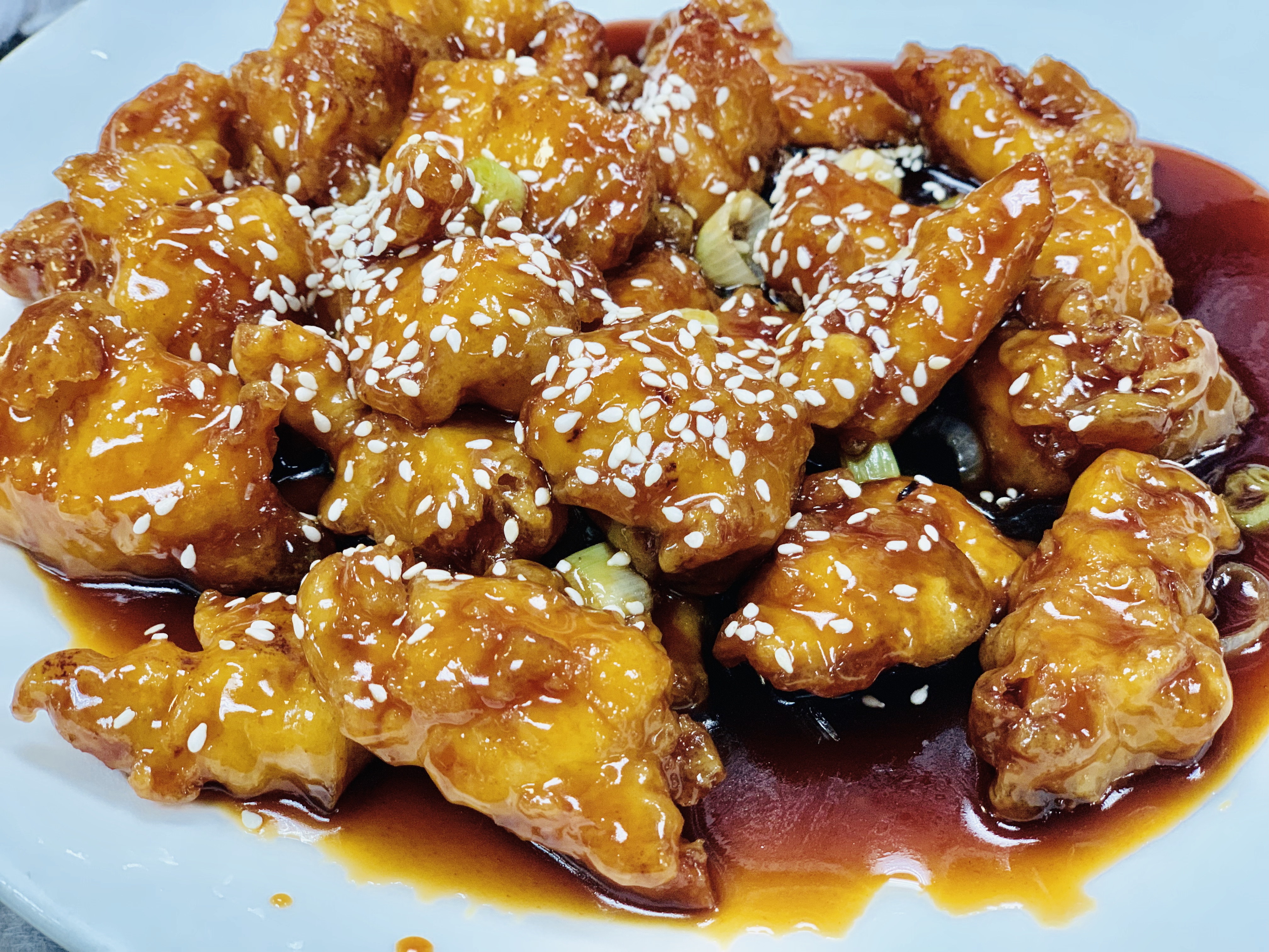 Order Sesame Chicken food online from Red Bowl Asian Bistro store, Cary on bringmethat.com
