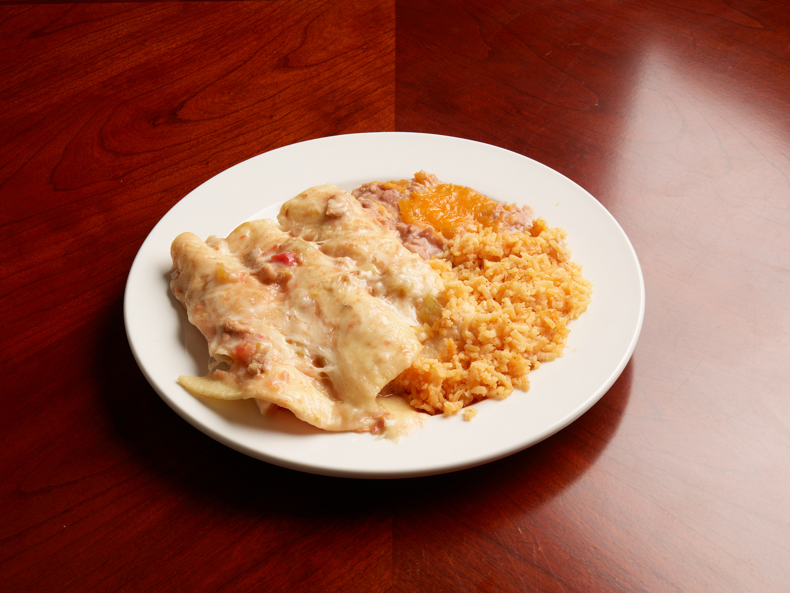 Order #8. Enchilada Plate food online from Tacos Navarro store, Pueblo on bringmethat.com