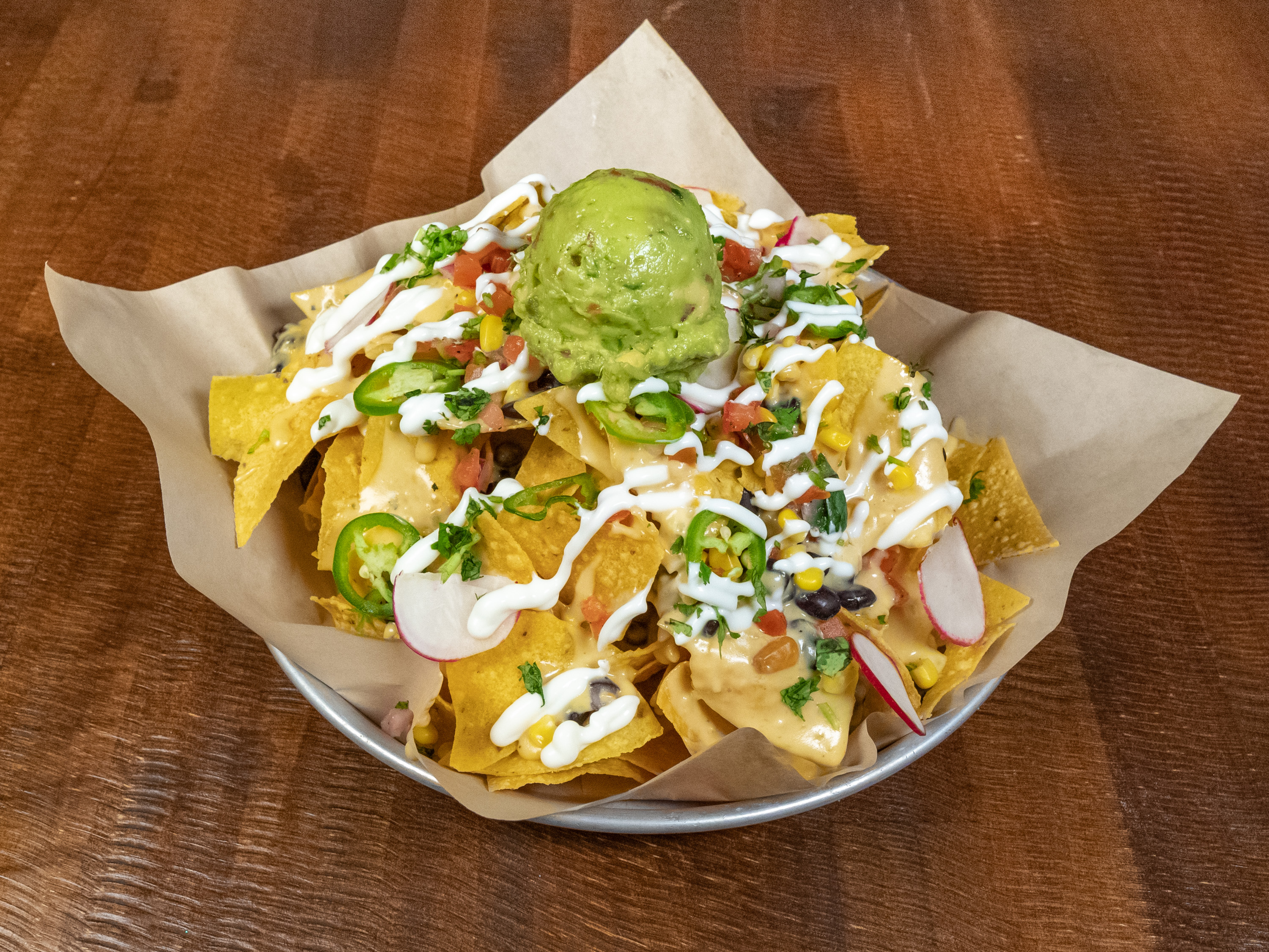 Order Piled High Nachos food online from Pedal Haus Brewery store, Chandler on bringmethat.com