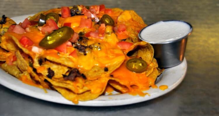 Order Nachos food online from Heroes Sports Oyster Bar and Grill store, Goldsboro on bringmethat.com