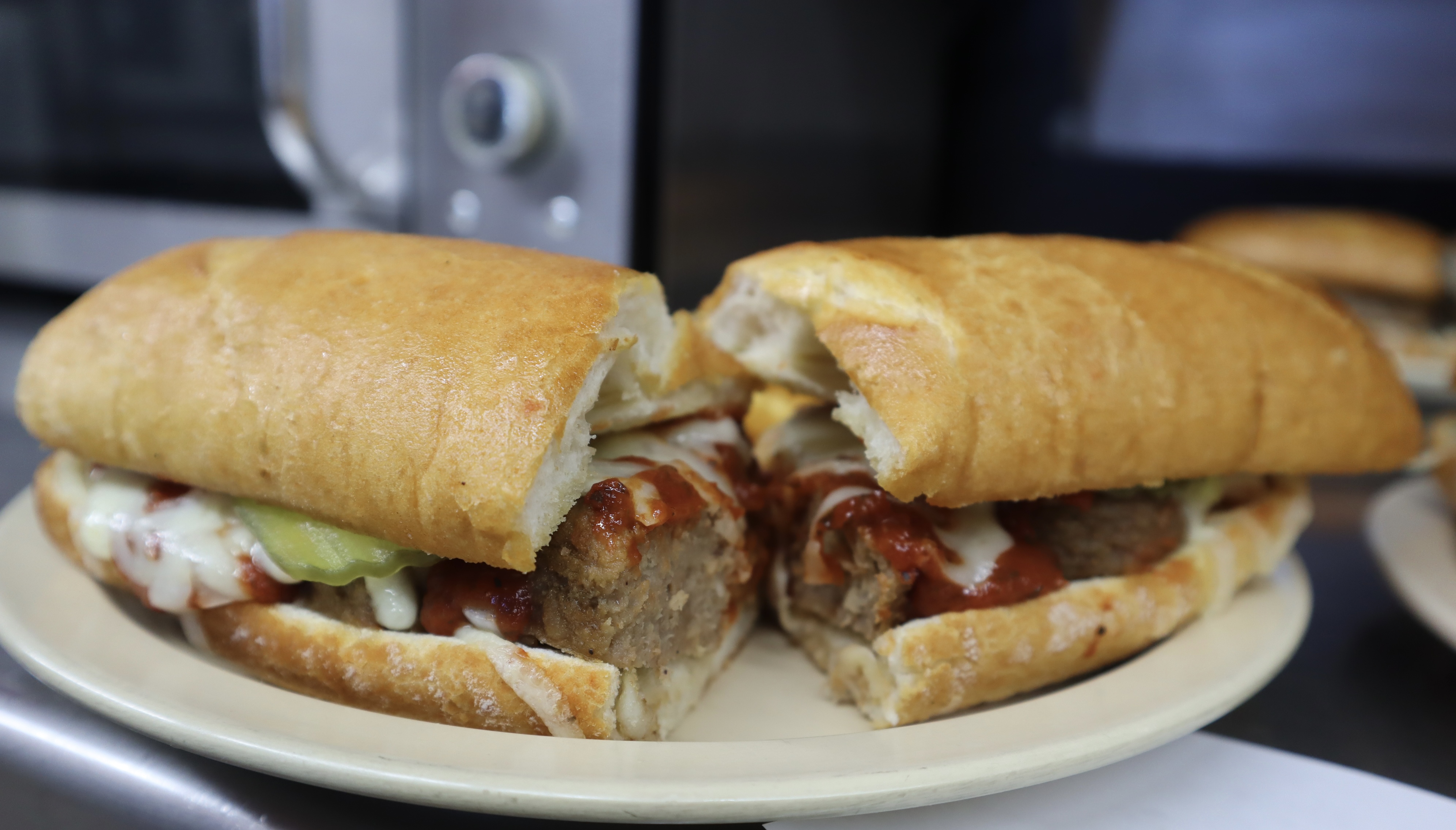 Order Meatball Sandwich food online from Angilo's Pizza store, Louisville on bringmethat.com