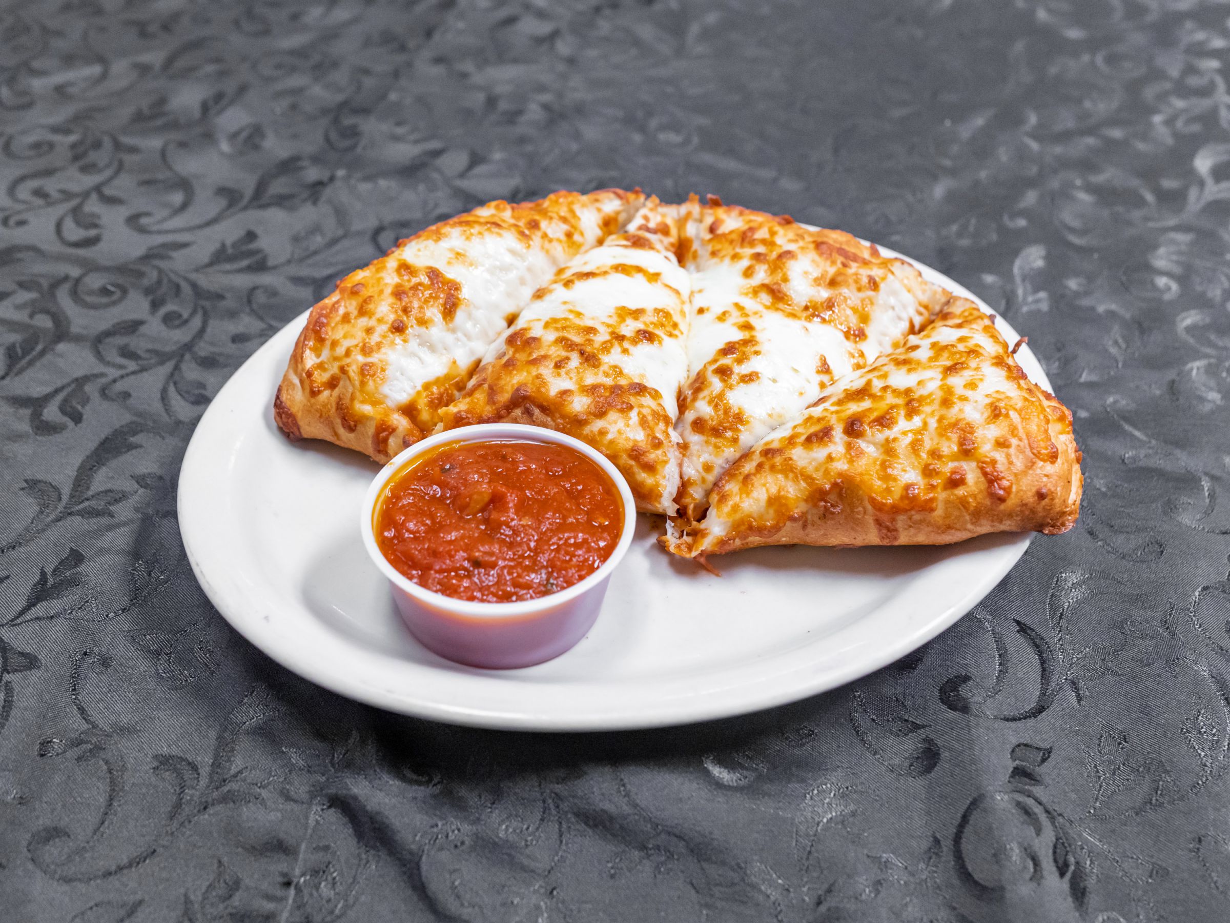 Order 10" Build Your Own Calzone food online from Boston Pizzeria store, Greenville on bringmethat.com