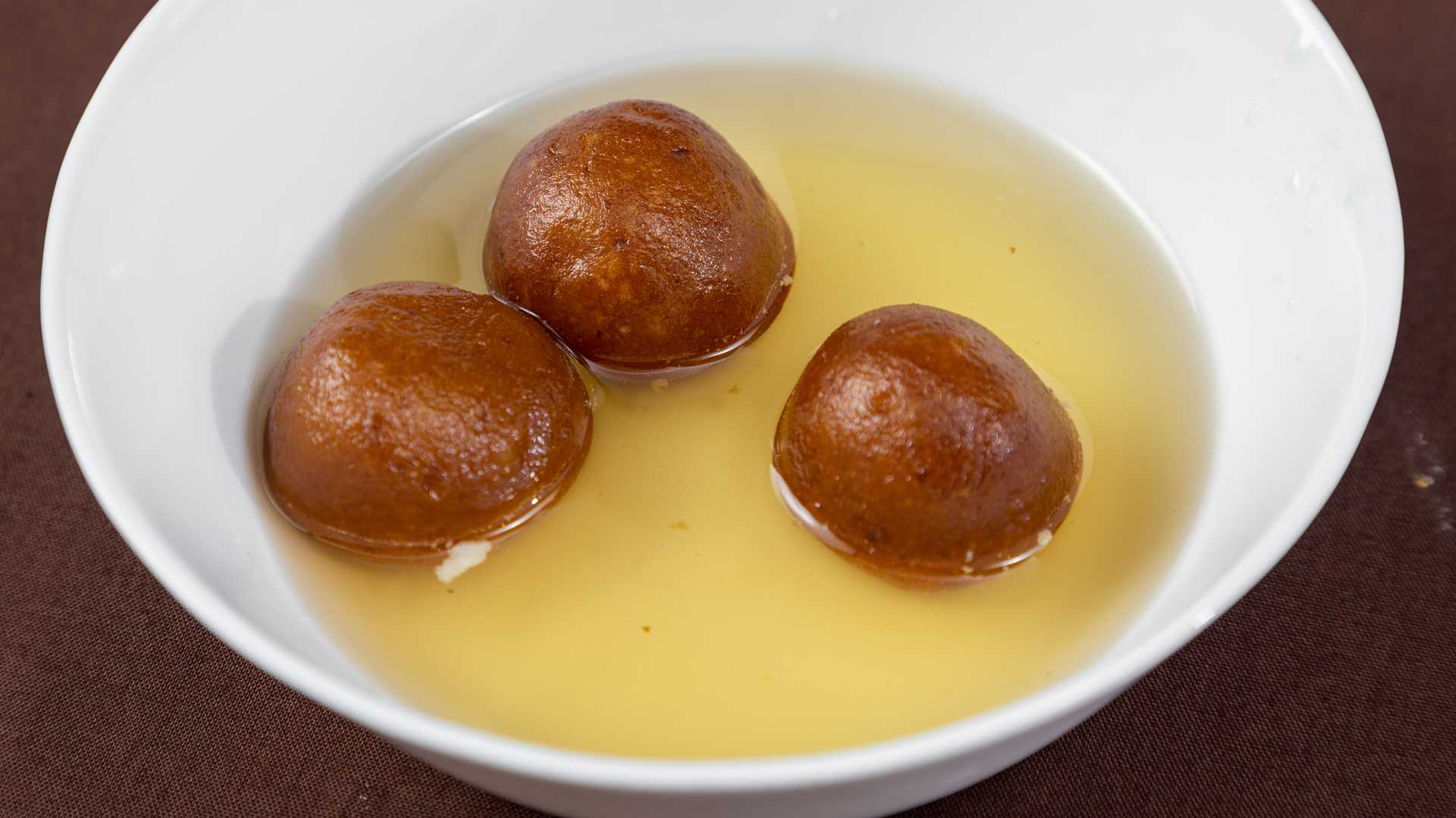 Order 4 Piece Gulab Jamun food online from Curry Hunt store, Chicago on bringmethat.com