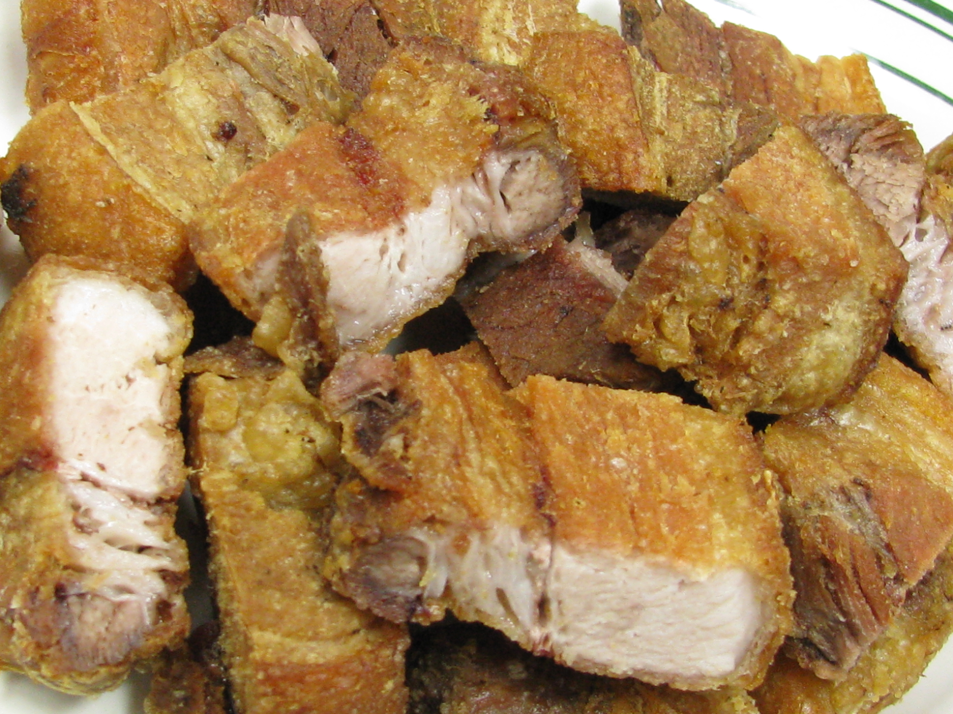 Order Fried Pork Belly (Lechon Kawal)i food online from Maynila On Main Street store, Carson on bringmethat.com