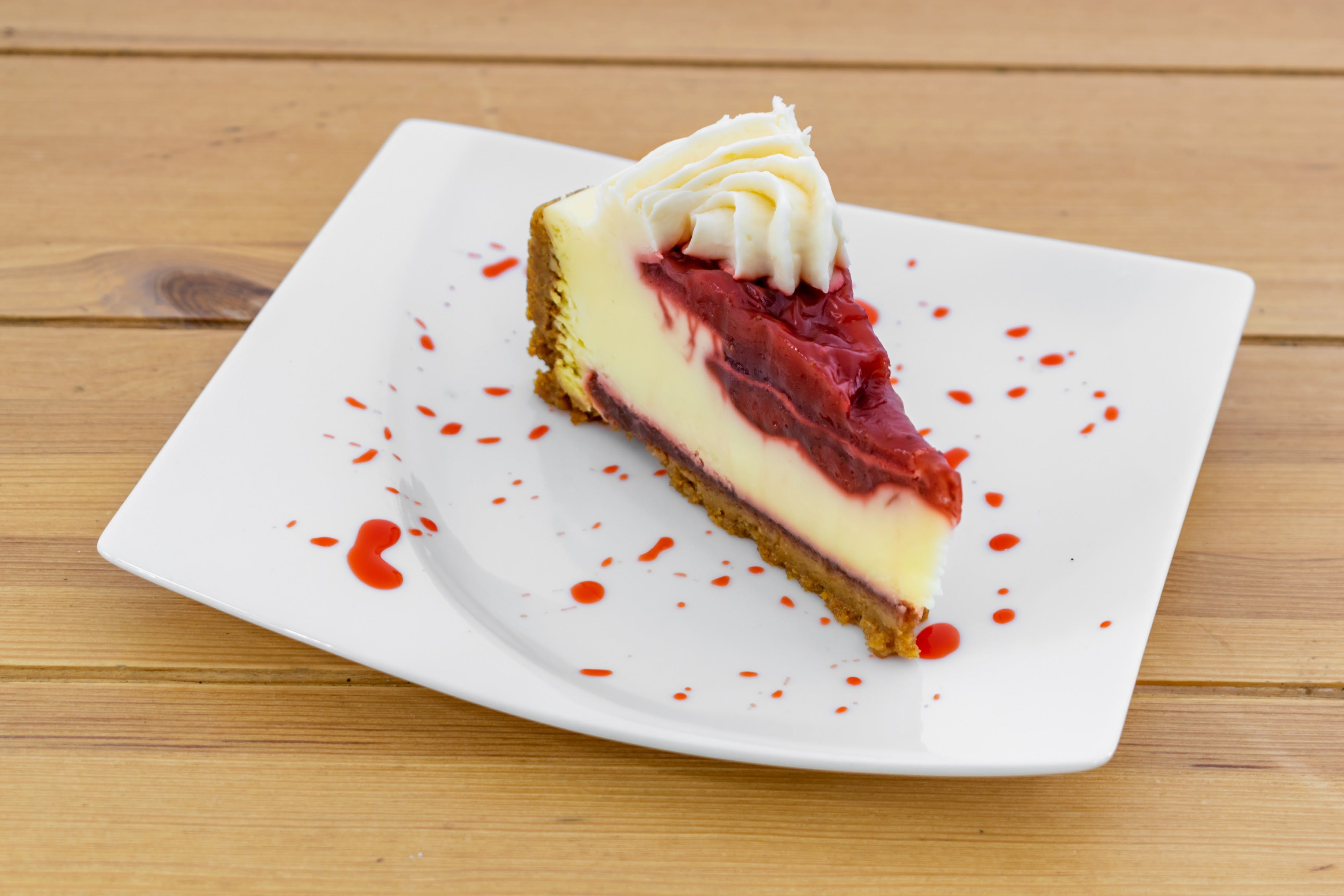 Order Strawberry Cheesecake - Dessert food online from Fratelli Pizza & Coffee store, Wayne on bringmethat.com