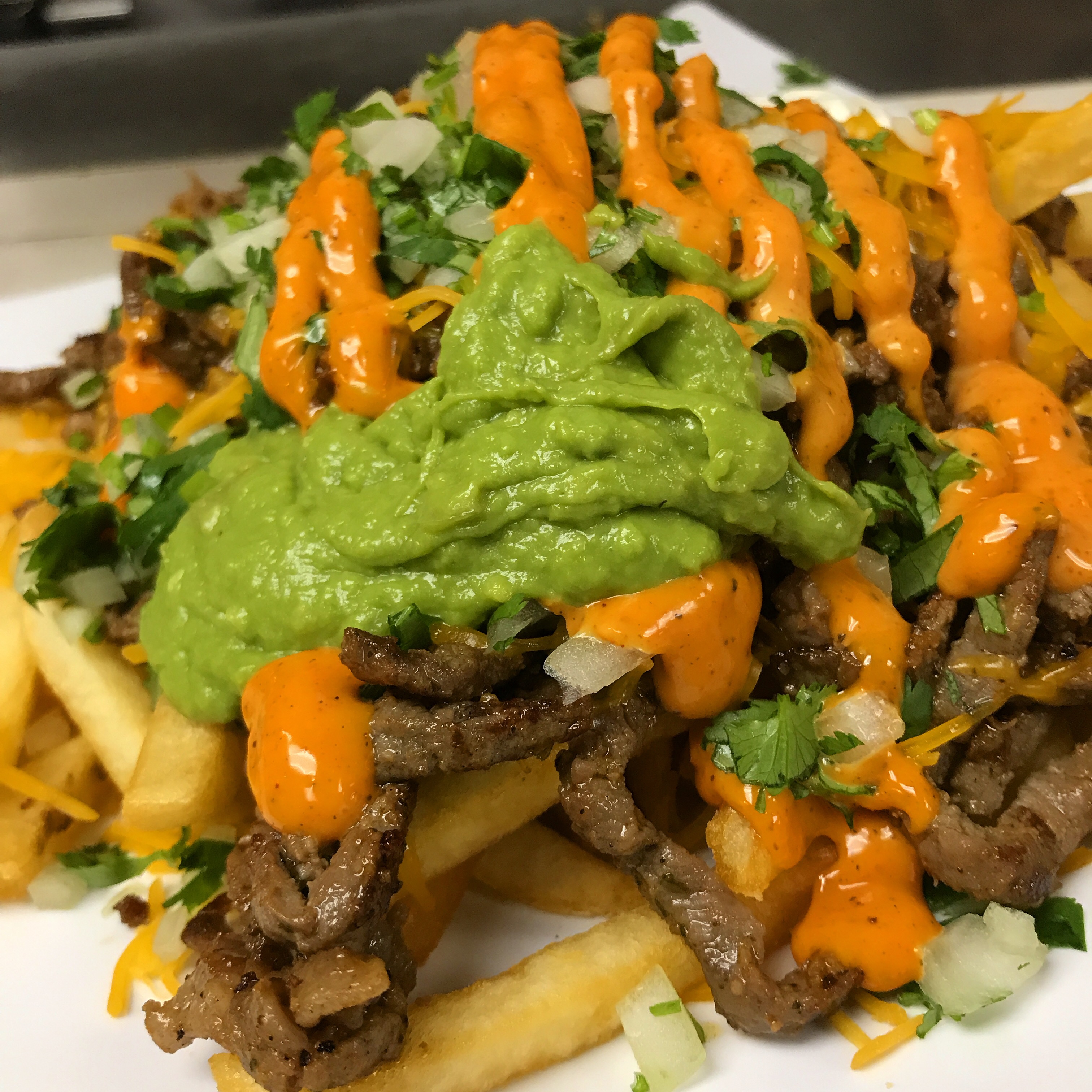 Order Asada Fries food online from World Famous Grill store, Bell Gardens on bringmethat.com