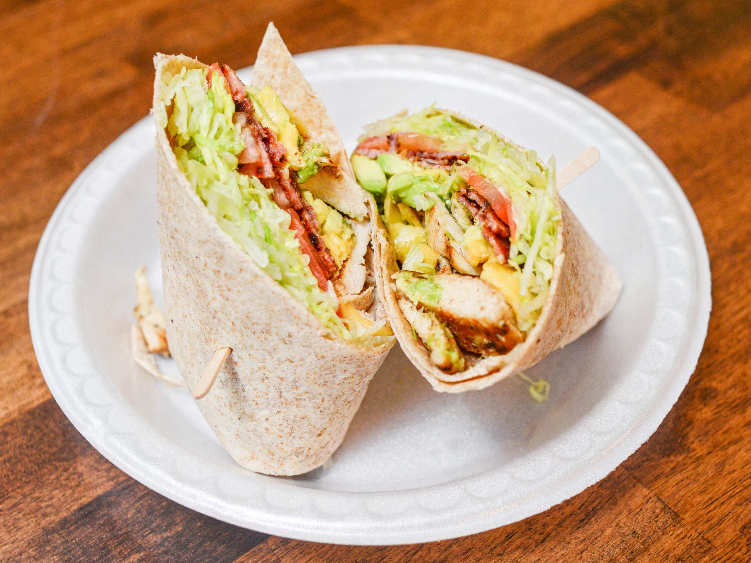 Order #21 Grilled Chicken & Avocado Wrap food online from Bagel Guys Deli store, Long Branch on bringmethat.com