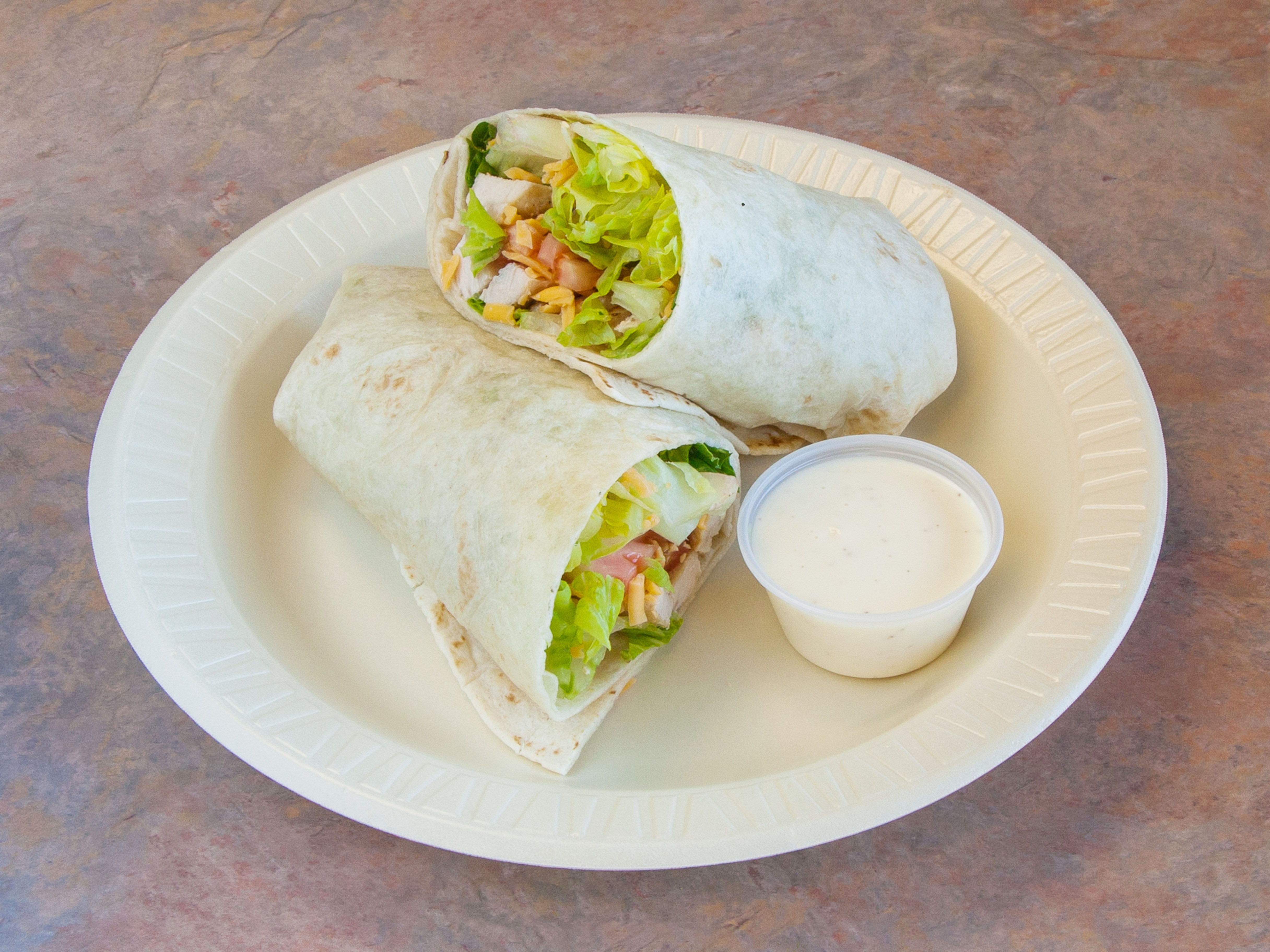 Order Caesar Chicken Wrap food online from Nabby's Restaurant and Catering store, Plainfield on bringmethat.com