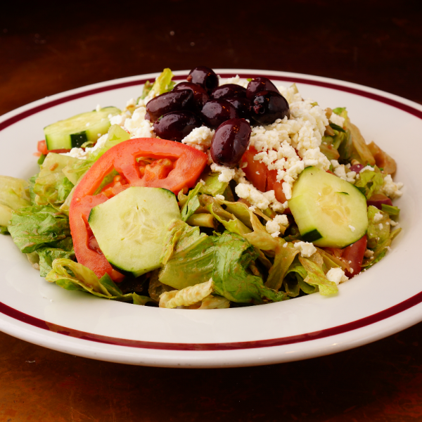 Order Greek Salad food online from La Creperie Cafe store, La Verne on bringmethat.com