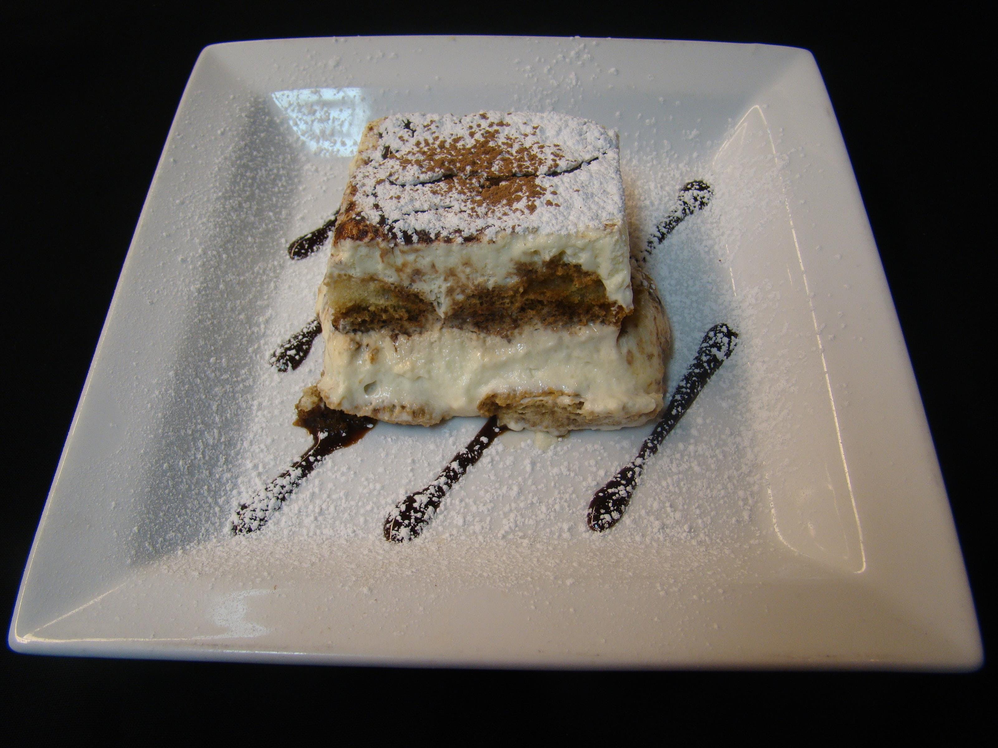 Order Homemade Tiramisu - Dessert food online from Rocco Pizzeria store, New Paltz on bringmethat.com