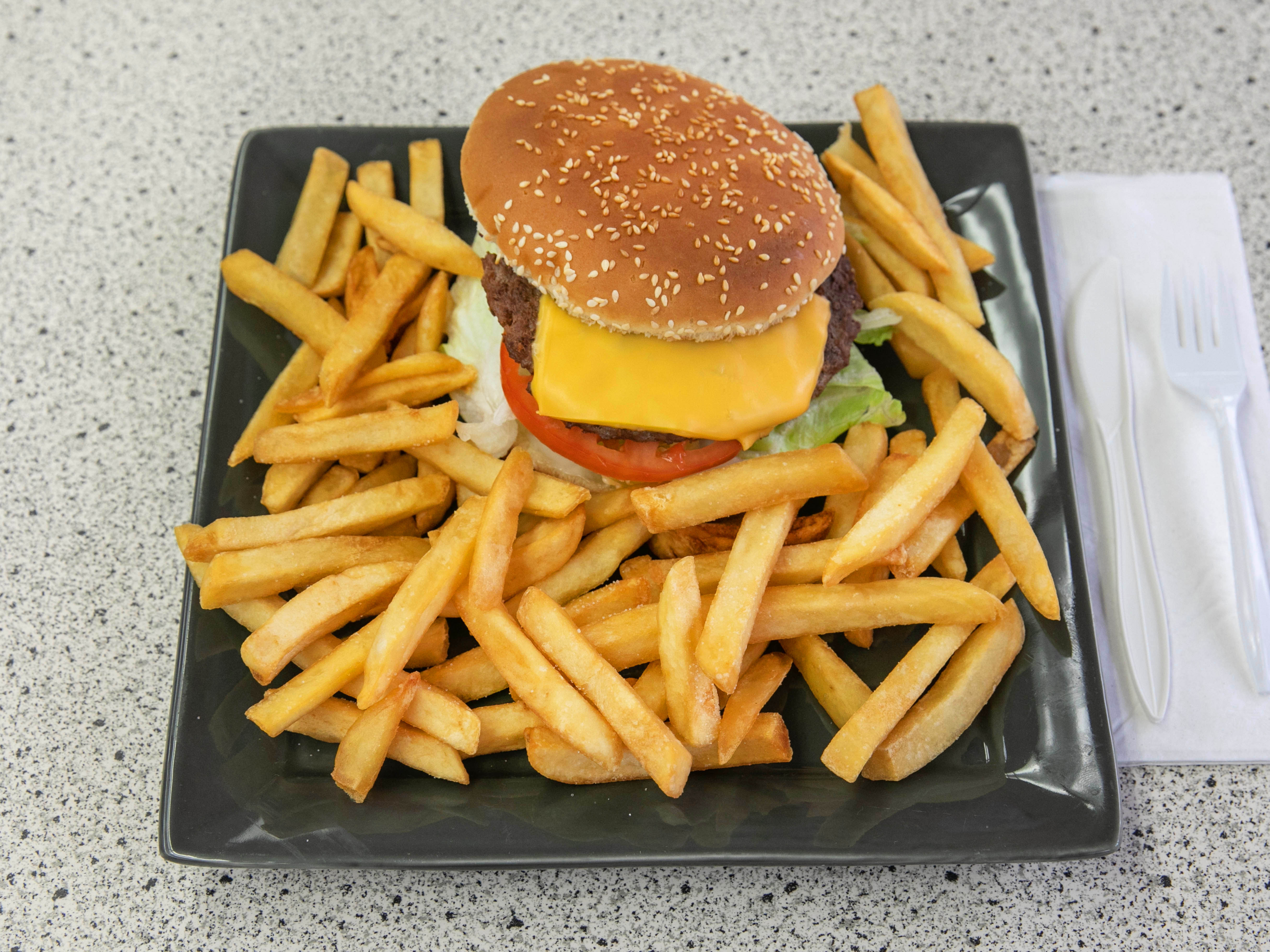 Order Cheeseburger food online from PJs Grill store, Columbus on bringmethat.com