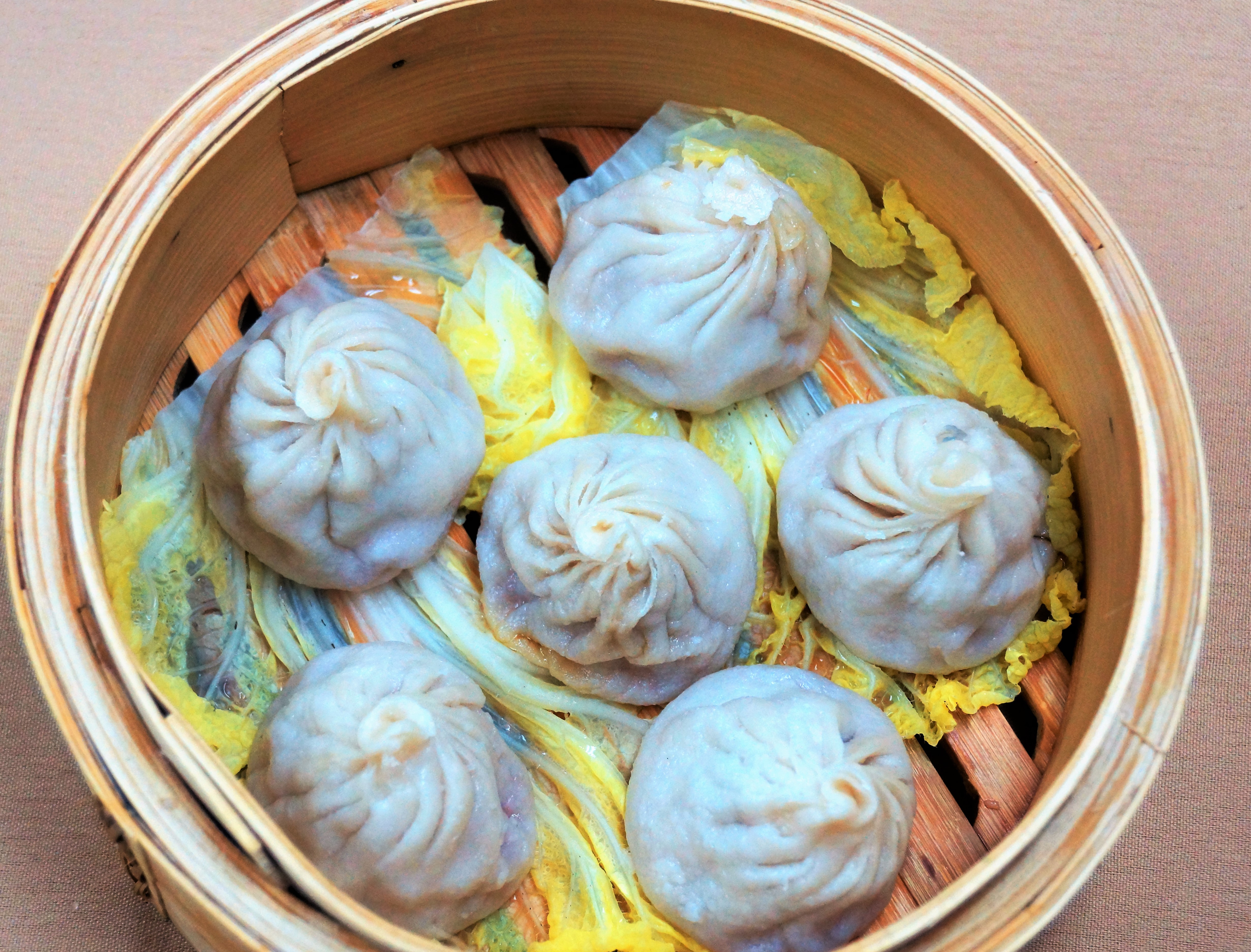 Order 25. Shanghai Juicy Pork Buns food online from Dim Sum Palace store, New York on bringmethat.com