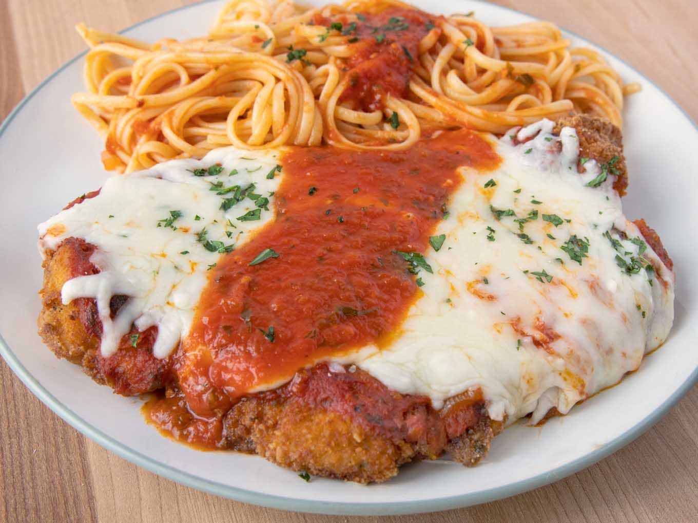Order Chicken Parmigiana - Individual food online from John's Of Arthur Ave Restaurant store, Middletown on bringmethat.com