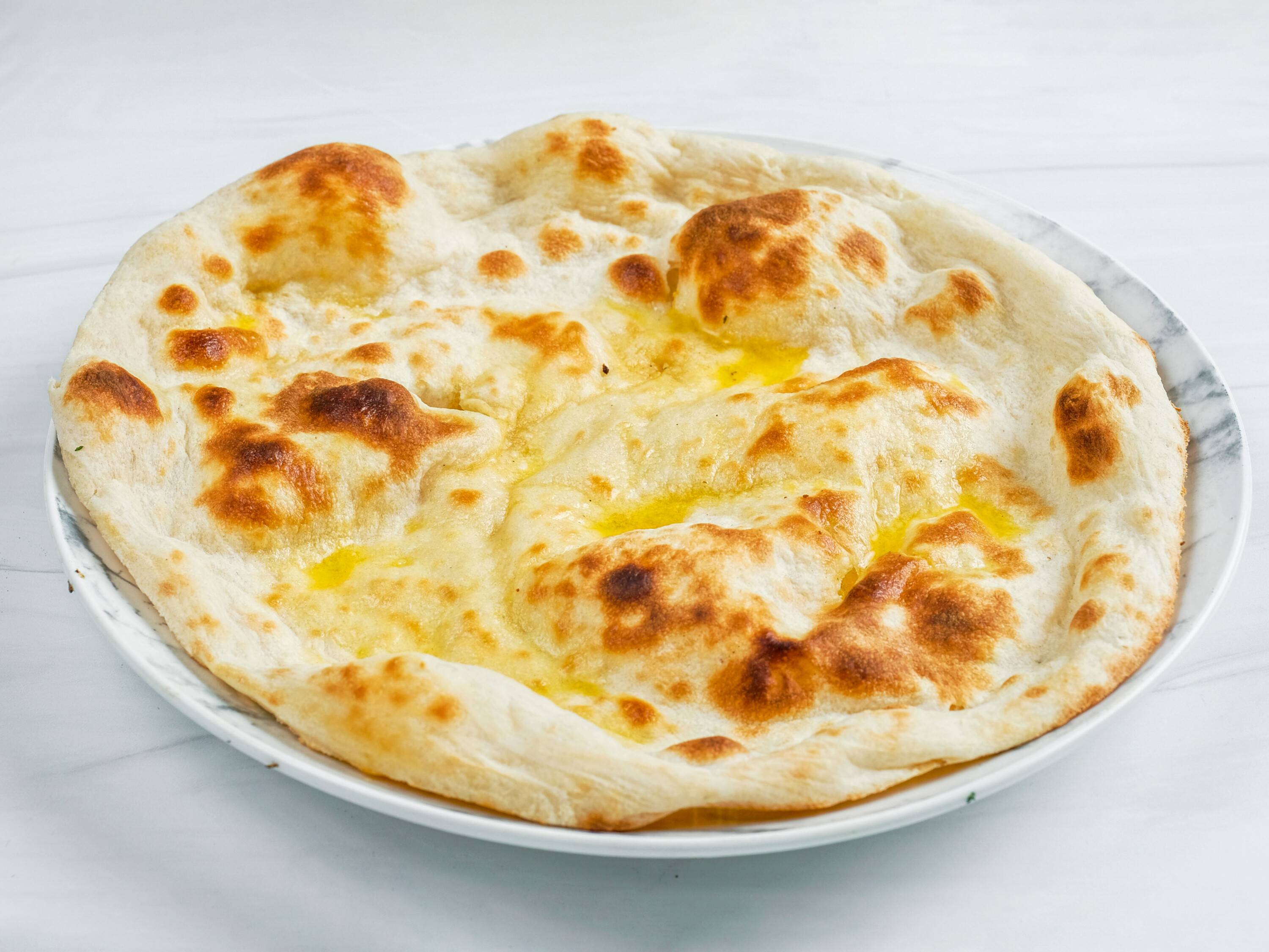 Order Naan food online from Kwality Kabab & Grill store, Carrollton on bringmethat.com