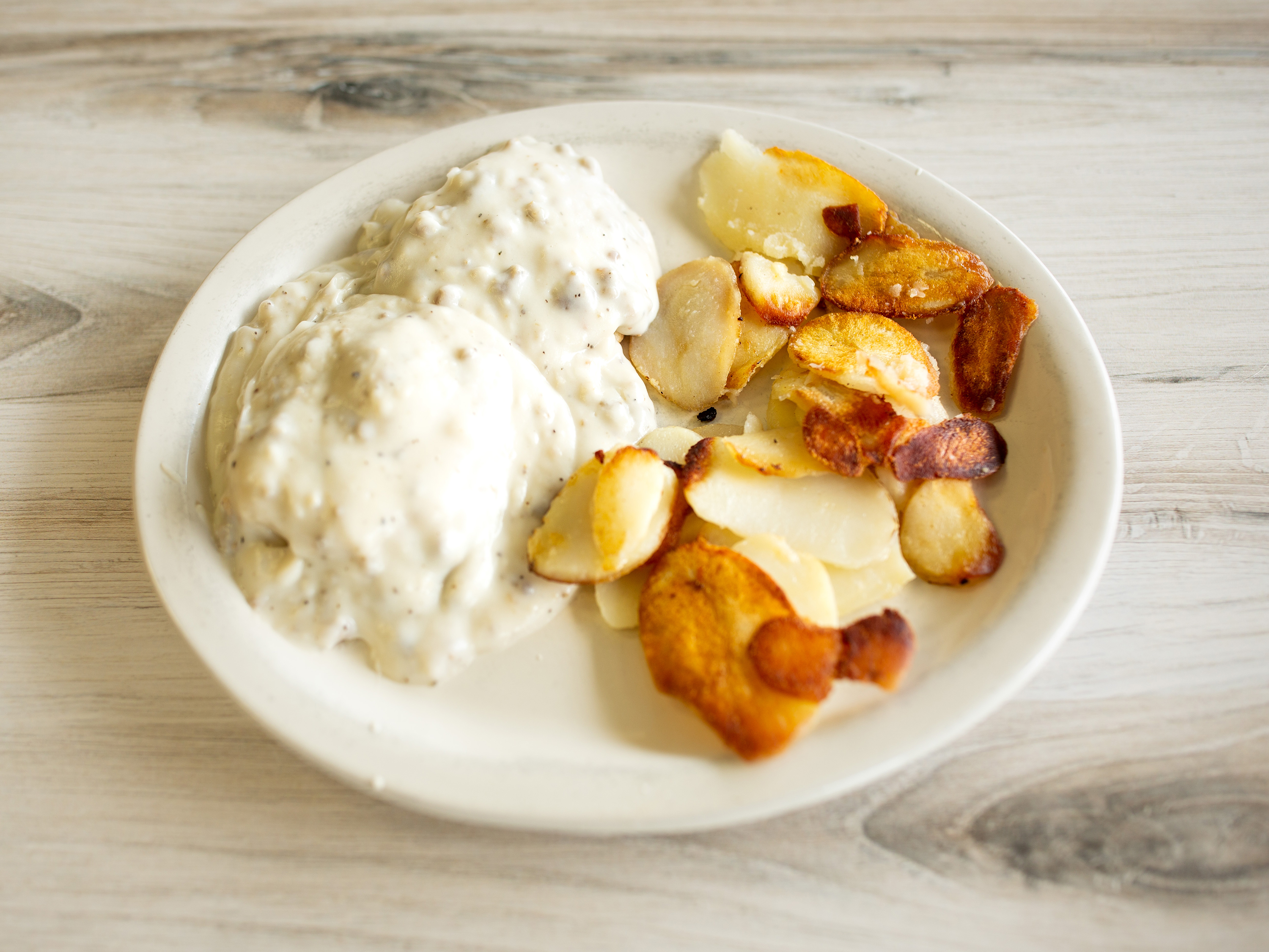 Order 1/2 Order of Biscuits and Gravy Combo food online from Morgan Corner Cafe store, Mooresville on bringmethat.com