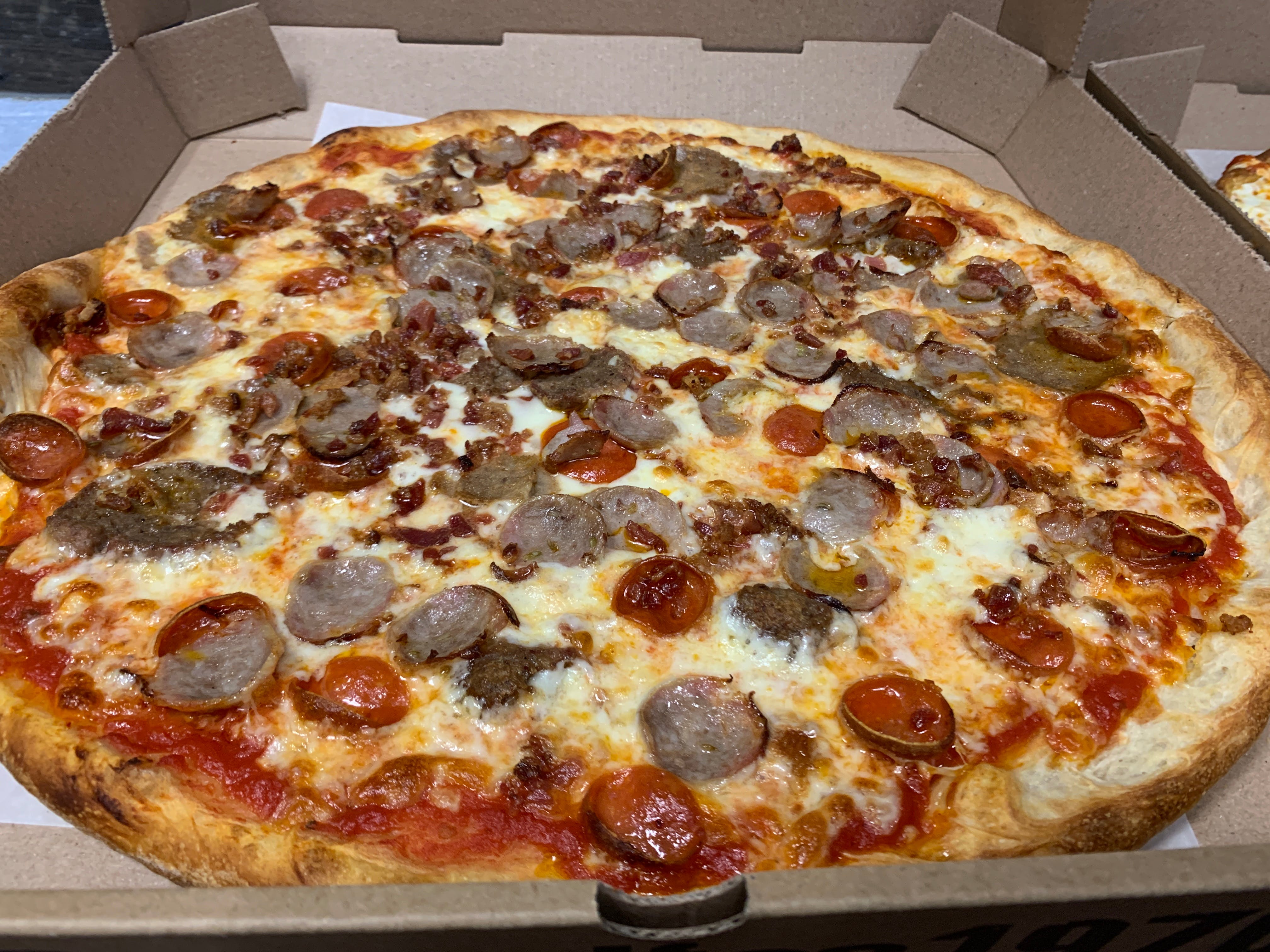 Order Meat Lovers Pizza - Personal food online from Rodolfo Pizzeria store, South Plainfield on bringmethat.com