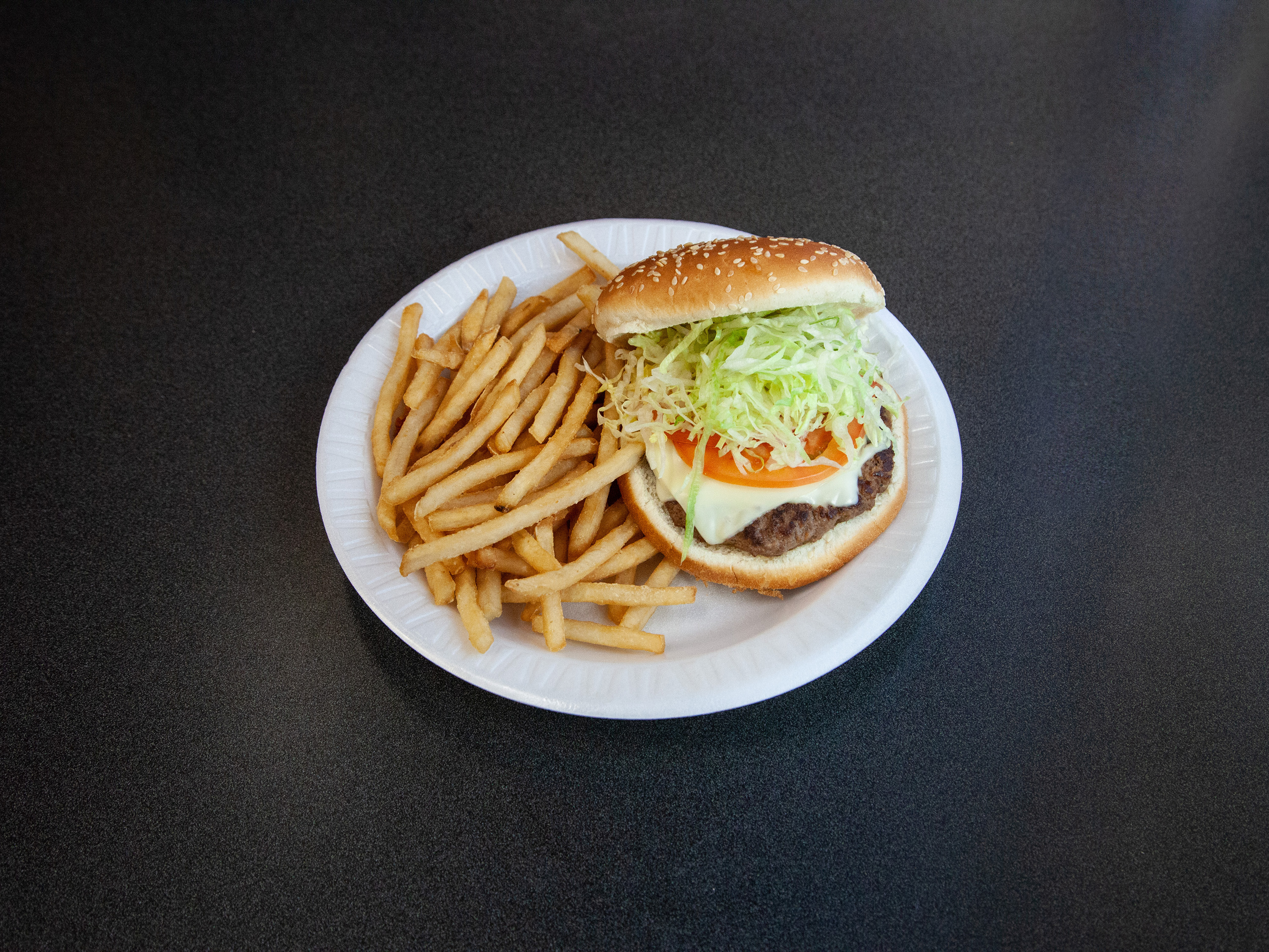 Order Cheeseburger food online from Jeans Cafe store, Philadelphia on bringmethat.com