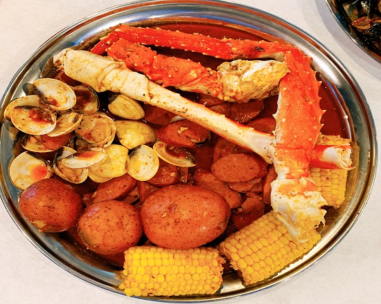 Order Combo F food online from Juicy Seafood store, Evansville on bringmethat.com