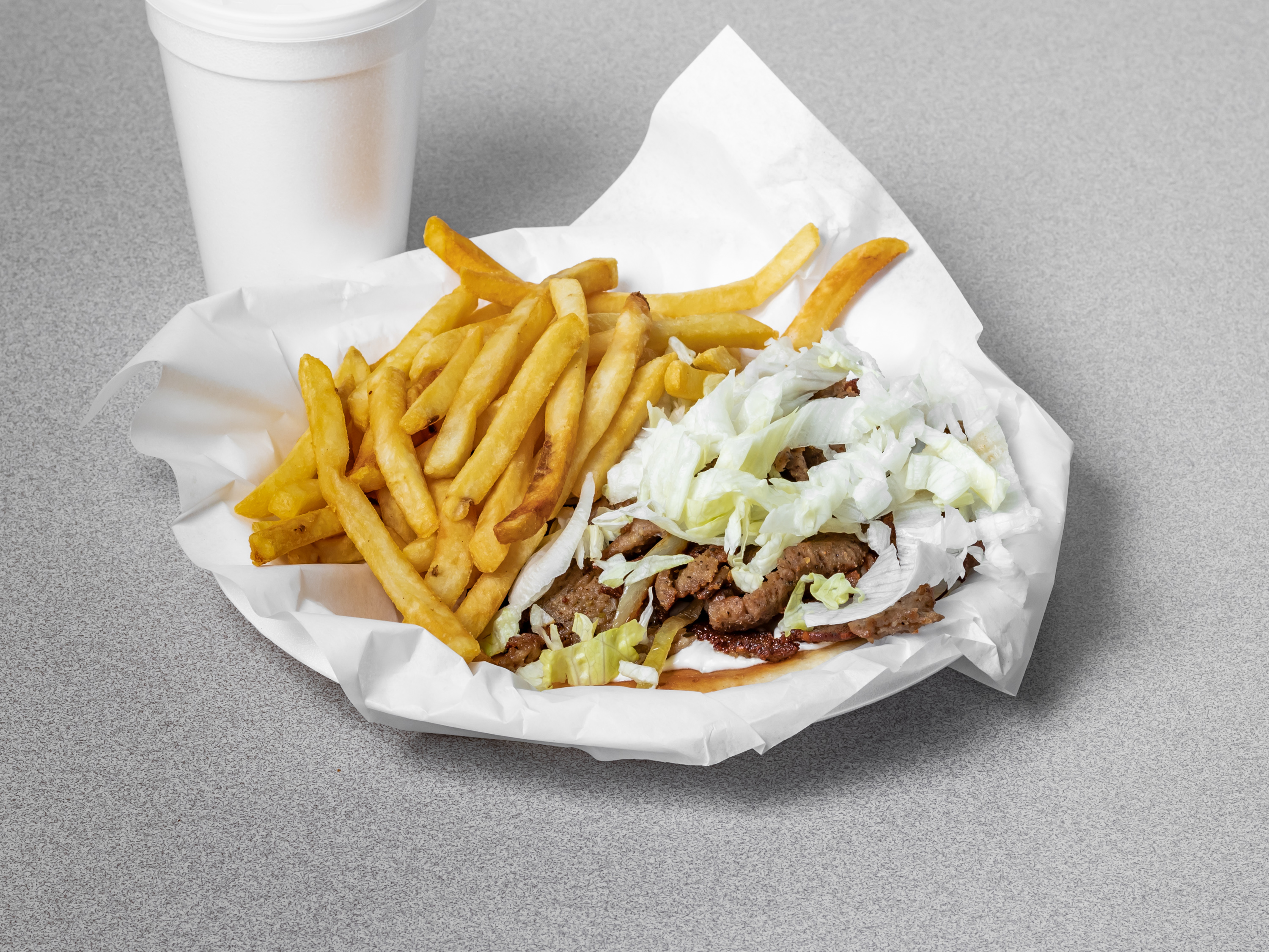 Order Gyro and Fries Special food online from Paul Donuts Subs & Gyros store, Fort Worth on bringmethat.com