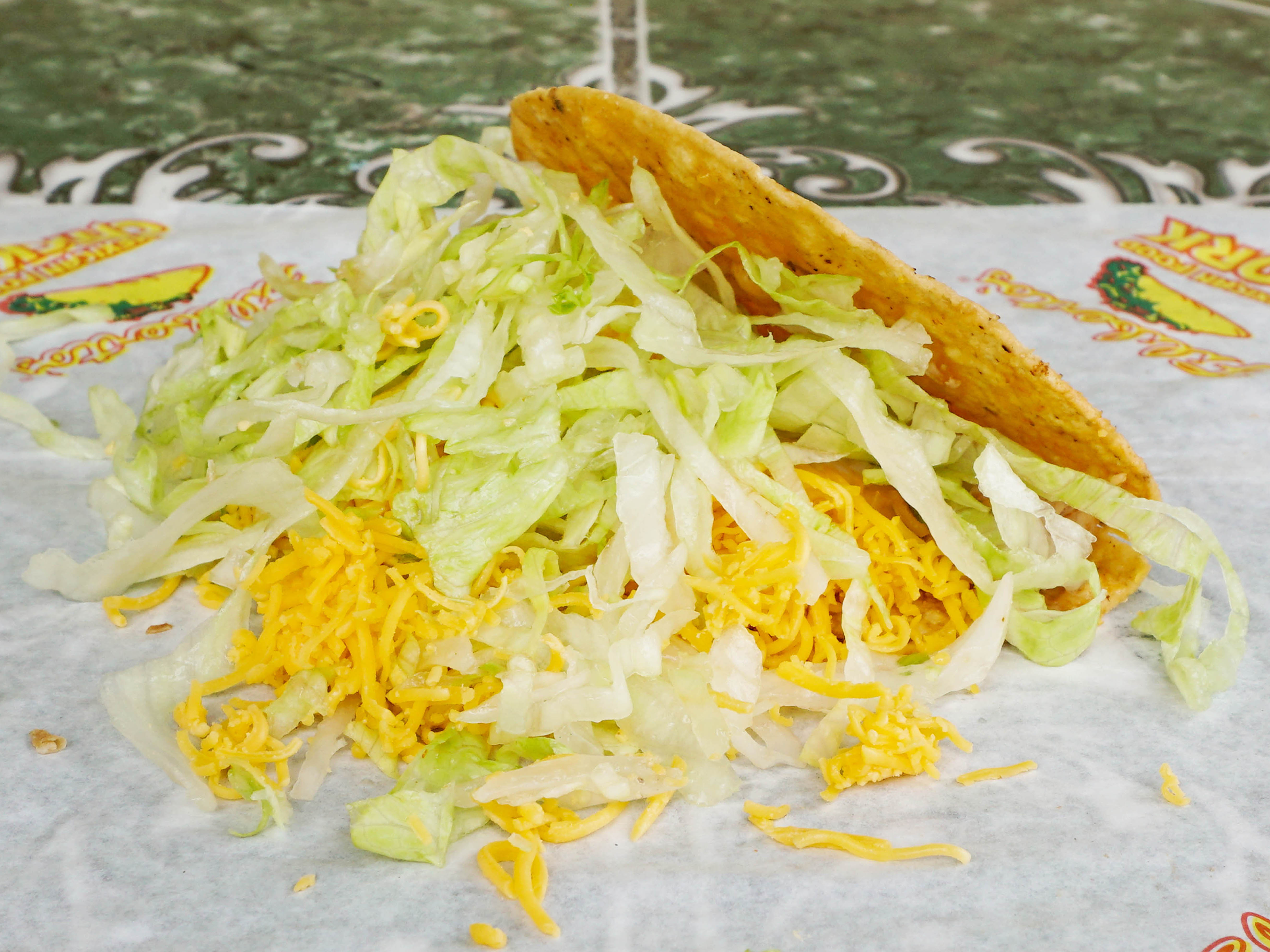 Order Chicken Taco food online from Filiberto's Mexican Food store, San Diego on bringmethat.com