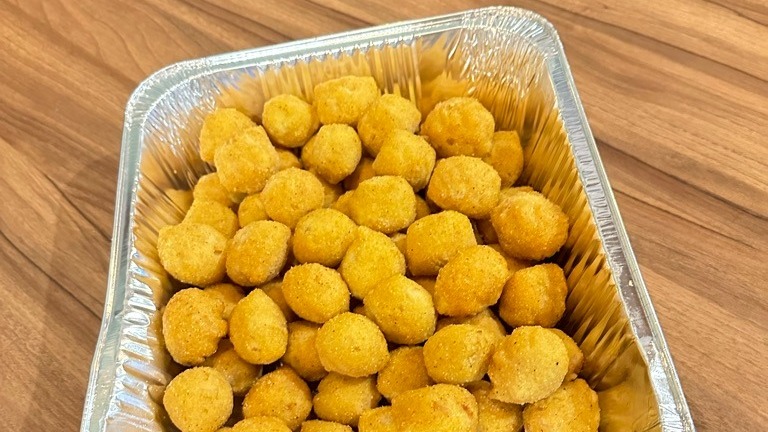 Order 1/2 Pan Hush Puppies food online from Captain Jay Fish & Chicken store, Southfield on bringmethat.com