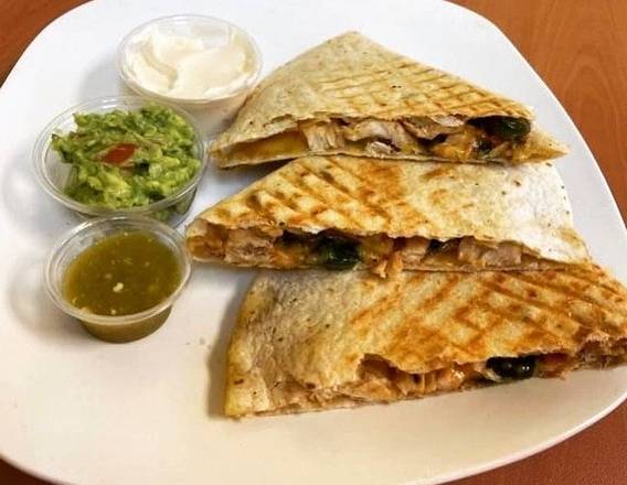 Order Chicken Quesadilla  food online from 8th Street Deli store, National City on bringmethat.com