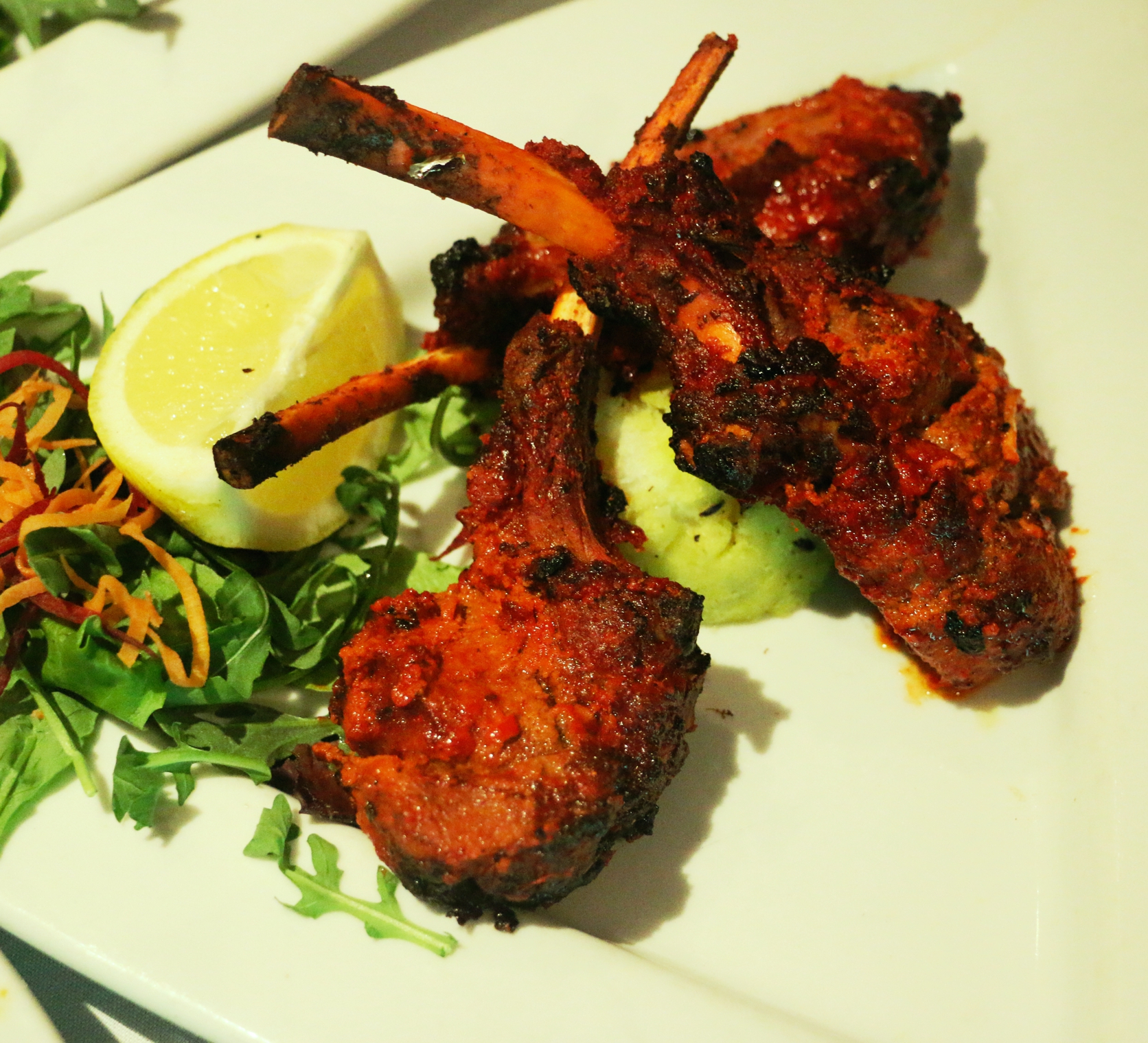 Order 34. Tandoori Lamb Chops food online from Darbar fine indian cuisine store, New York on bringmethat.com