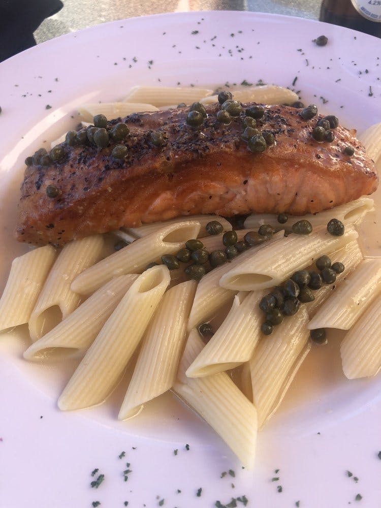 Order Salmon Picatta - Entree food online from Ducatis Pizzeria & Trattoria store, Myrtle Beach on bringmethat.com