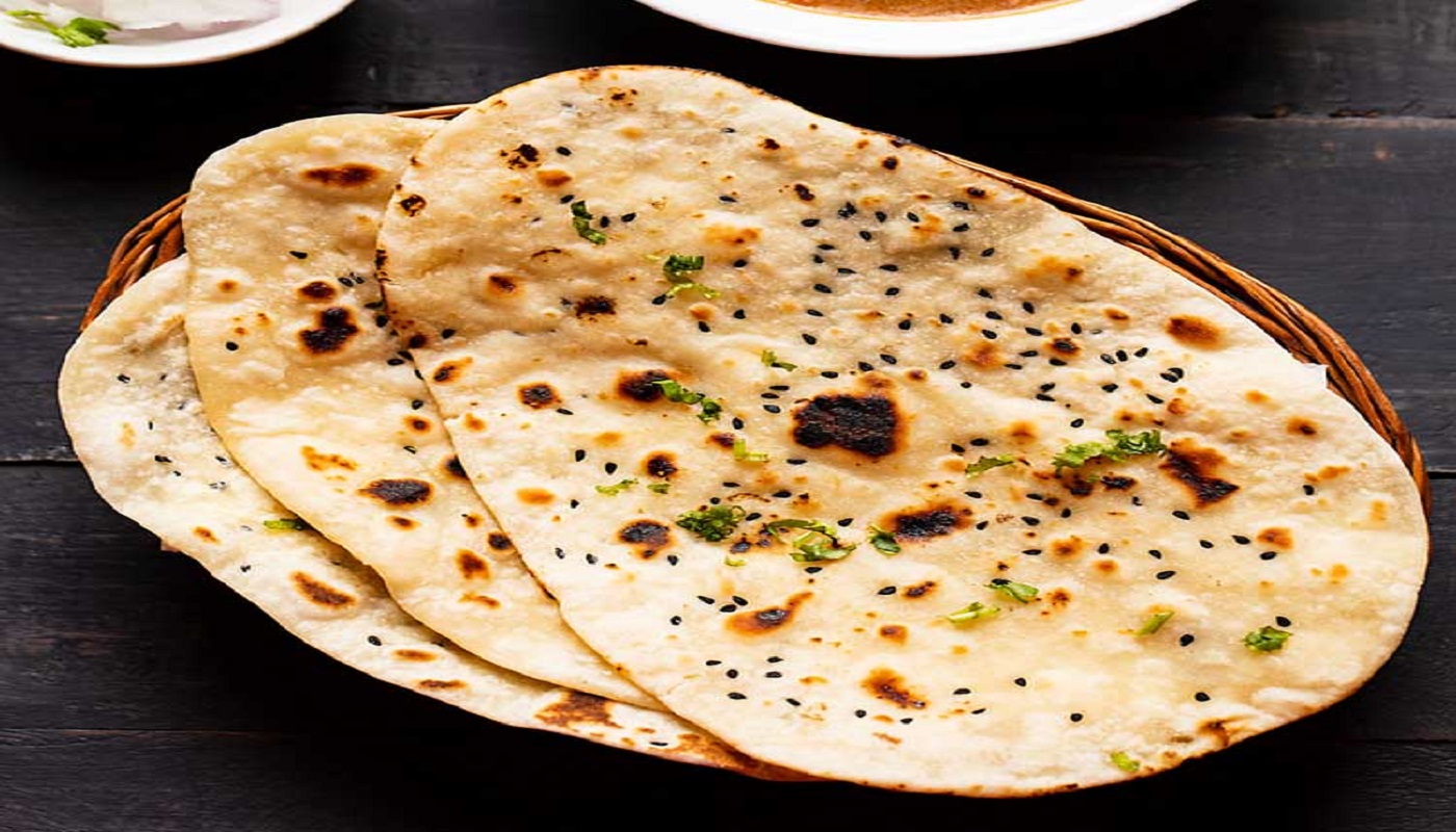 Order Plain Naan food online from Aroma Indian Cuisine store, Ann Arbor on bringmethat.com