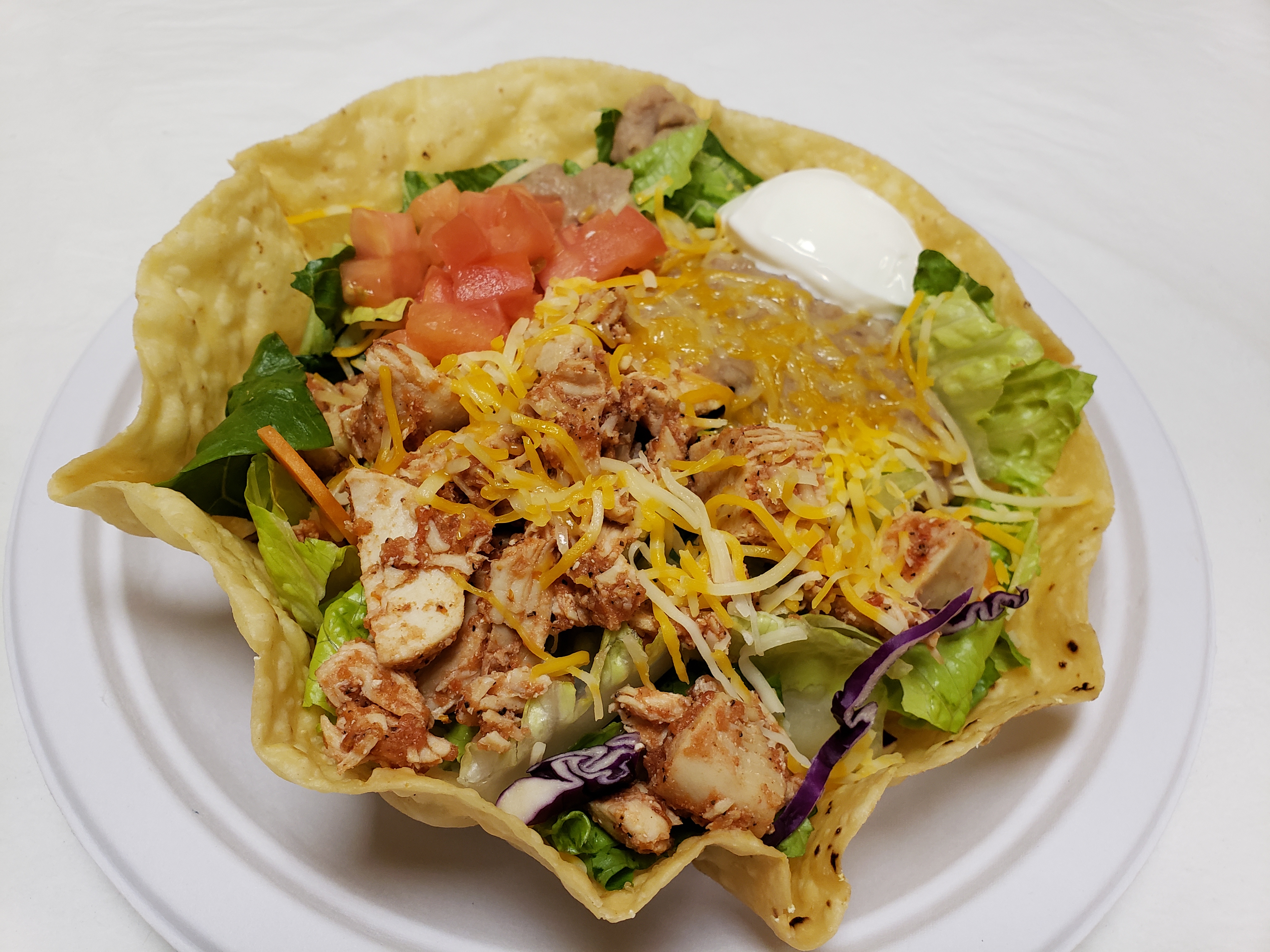Order Taco Salad food online from Poblanos Mexican Cafe store, Dallas on bringmethat.com