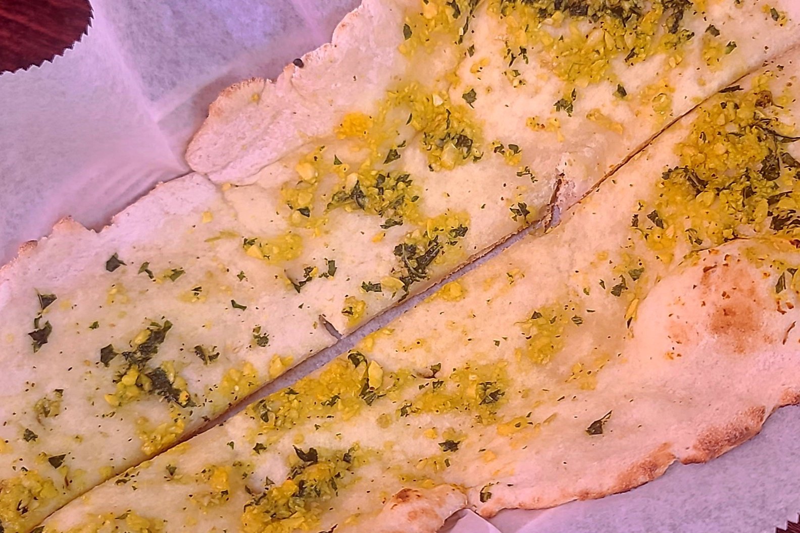 Order Gluten Free Pesto and Garlic Naan food online from Mission Curry House store, San Francisco on bringmethat.com